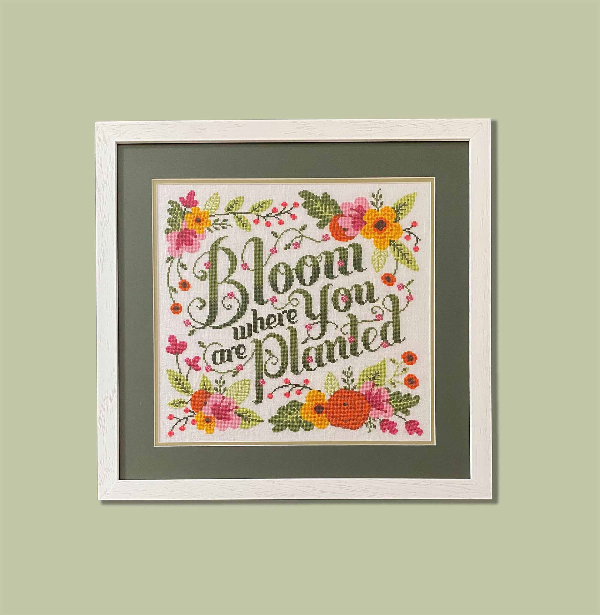 x-stitch Conservation framed by Lacing, conservation mount and UV Protected glass