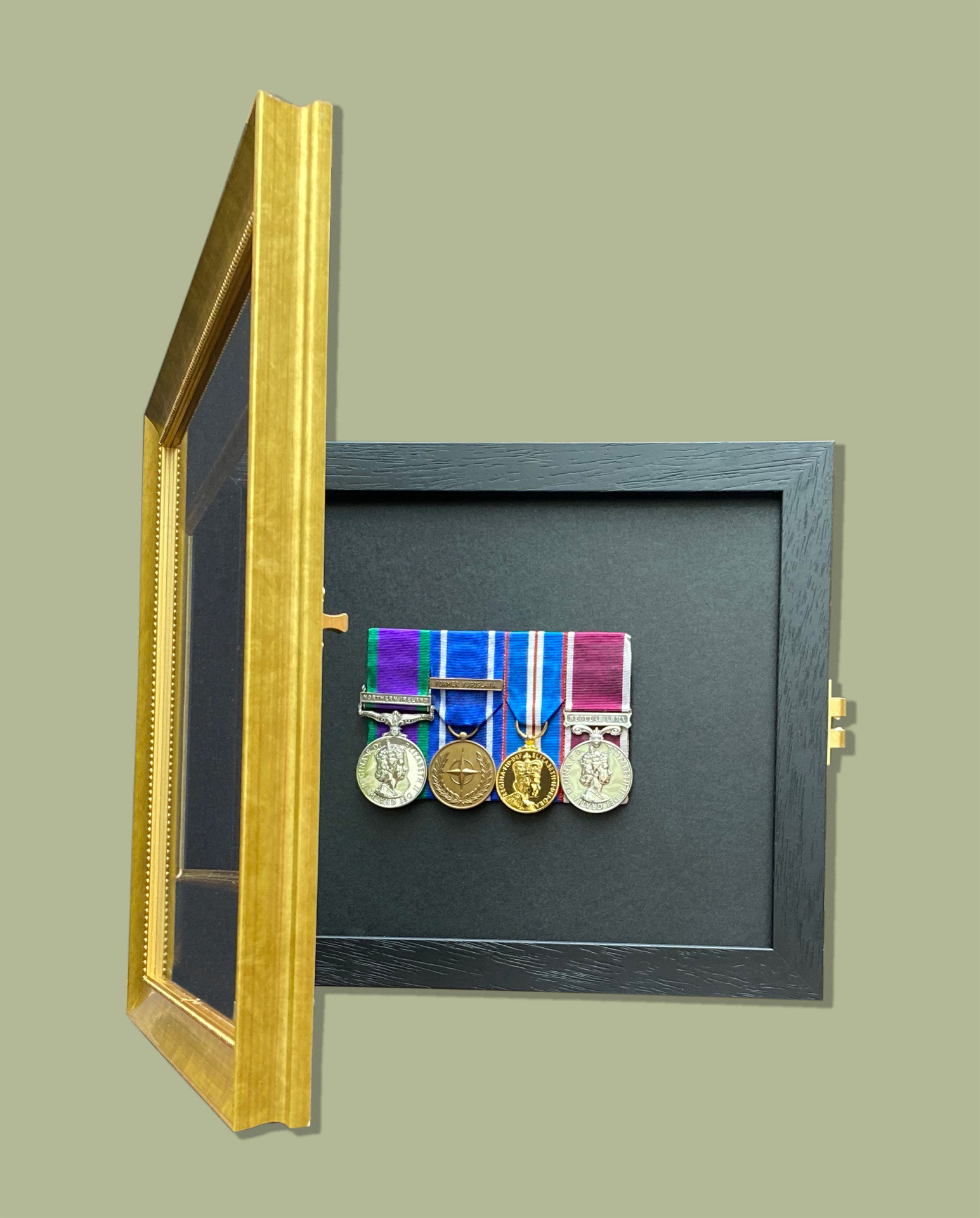 Framed Medal Case which allows mounted medals to be removed for wearing. Onyx Mount, Gold Fillet, Gold frame, Art Glass. Brass hinges and catch [Open View]