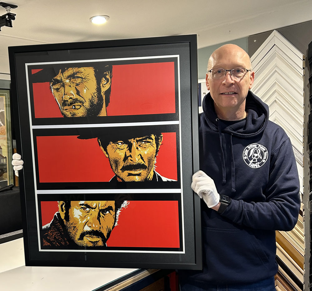 Poster Hinged to board, Matt black frame and black board