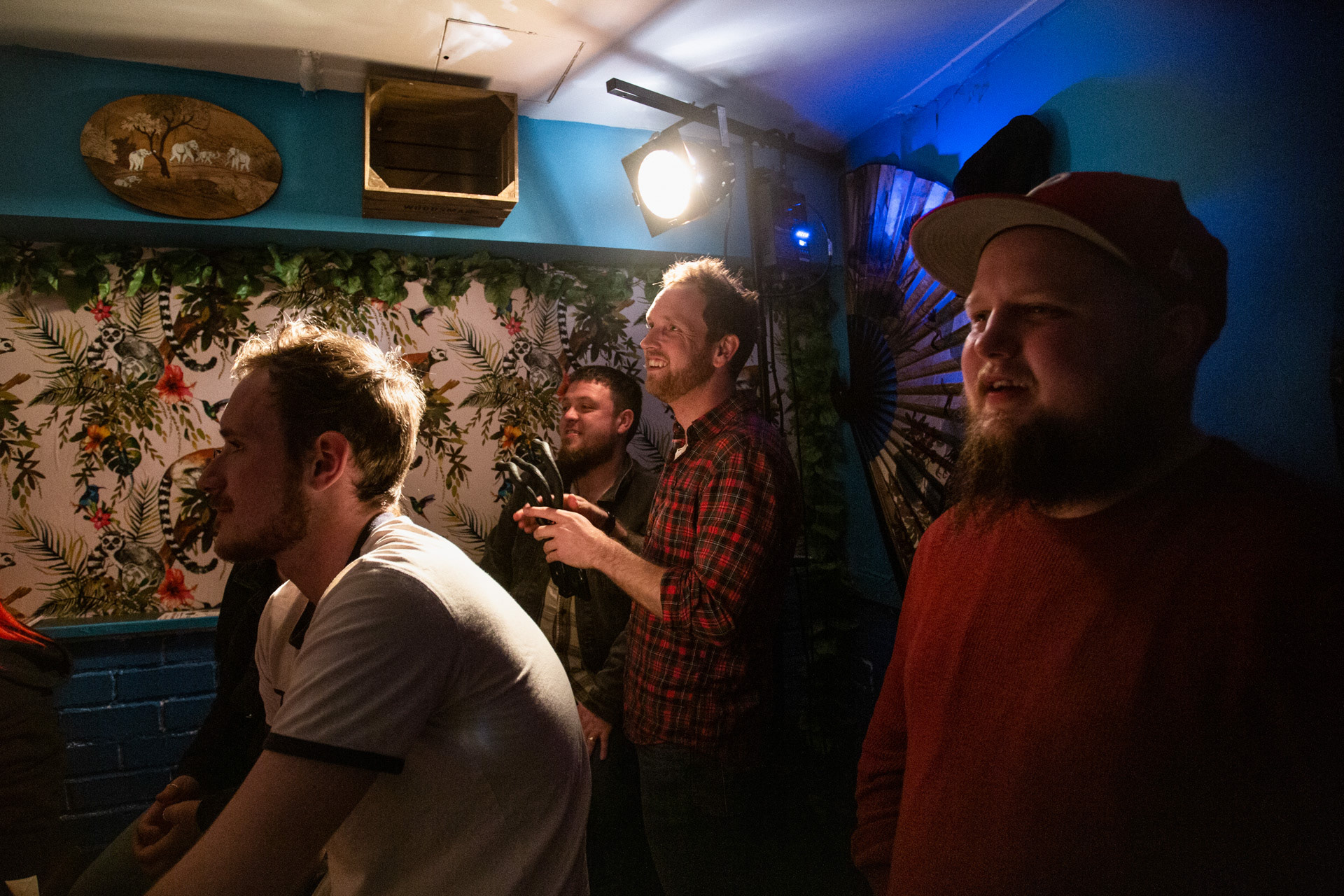 Matt (center) and friend Angus (right) at the back of the 52 Canoes basement during Mirth Meltdown.