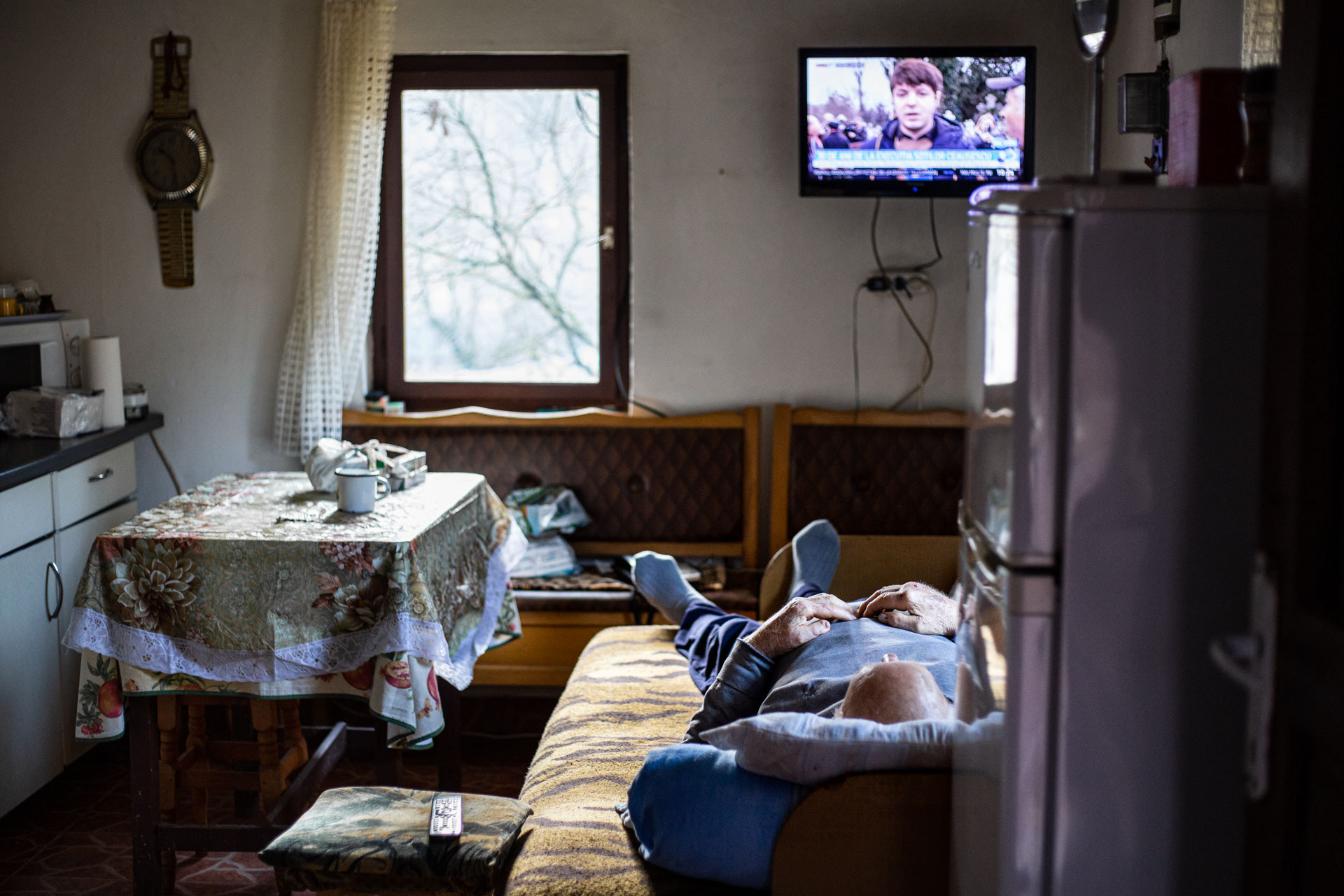 1. Grandfather watching programs about the '89 Revolution at Christmas. “They should not have shot him; they could have imprisoned him.”