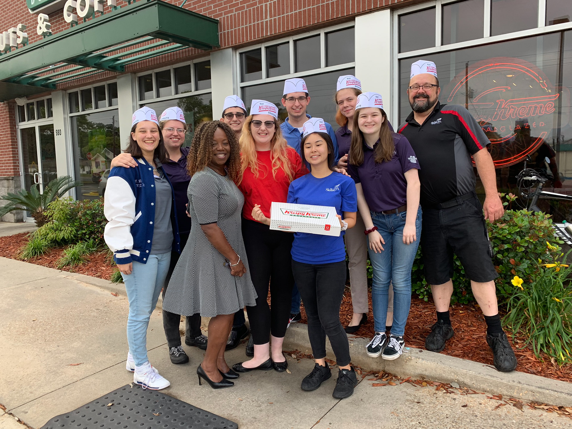 My state team and I taking a trip to Krispy Kreme
