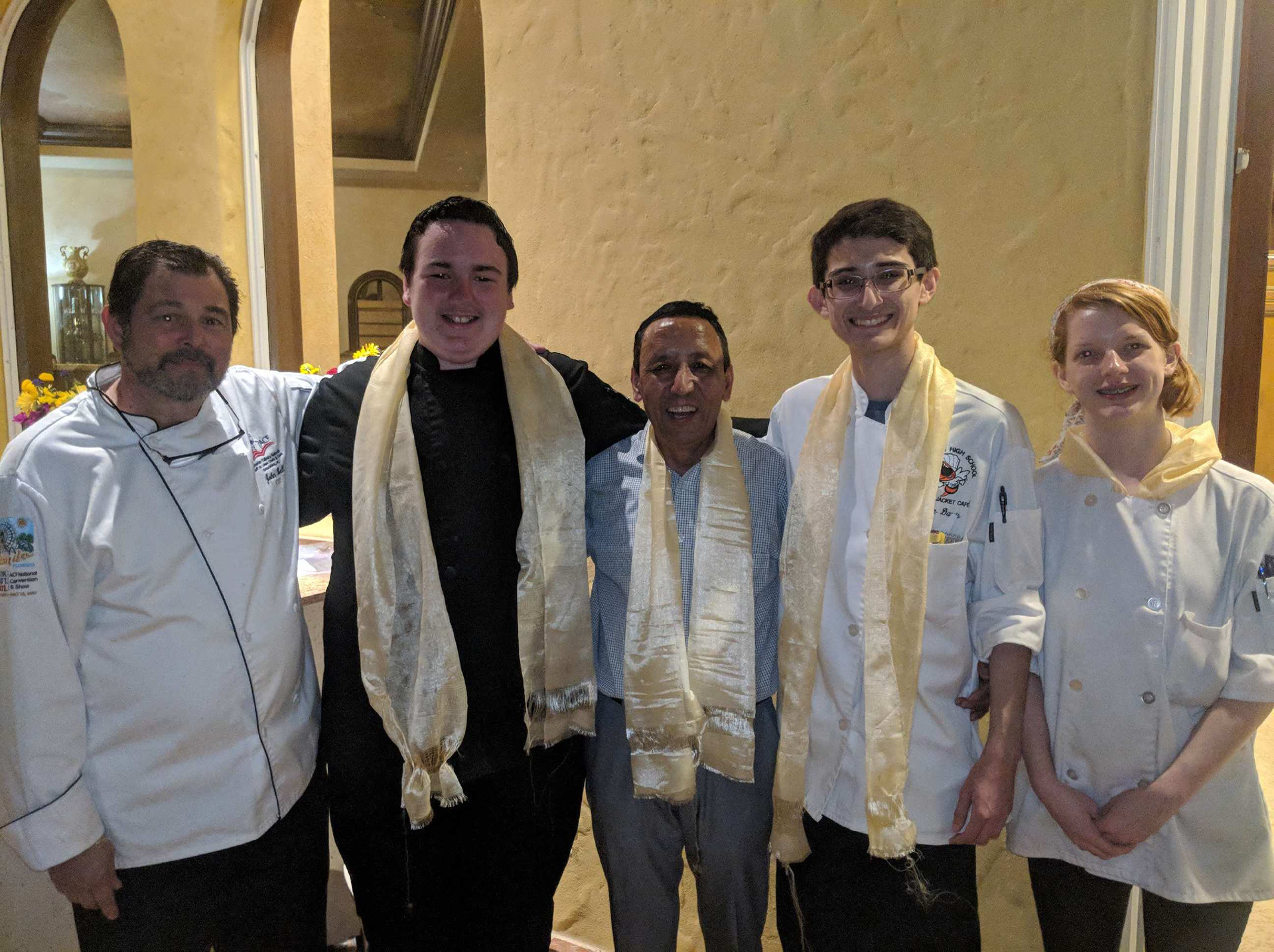Chef Bell, fellow students, and myself at a catering event with Apa Sherpa, the man with the record for the most climbs up Mount Everest