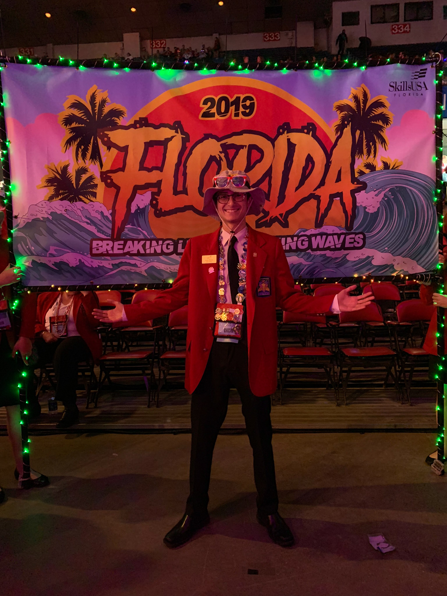 Me in front of the SkillsUSA Florida banner at the national opening ceremony