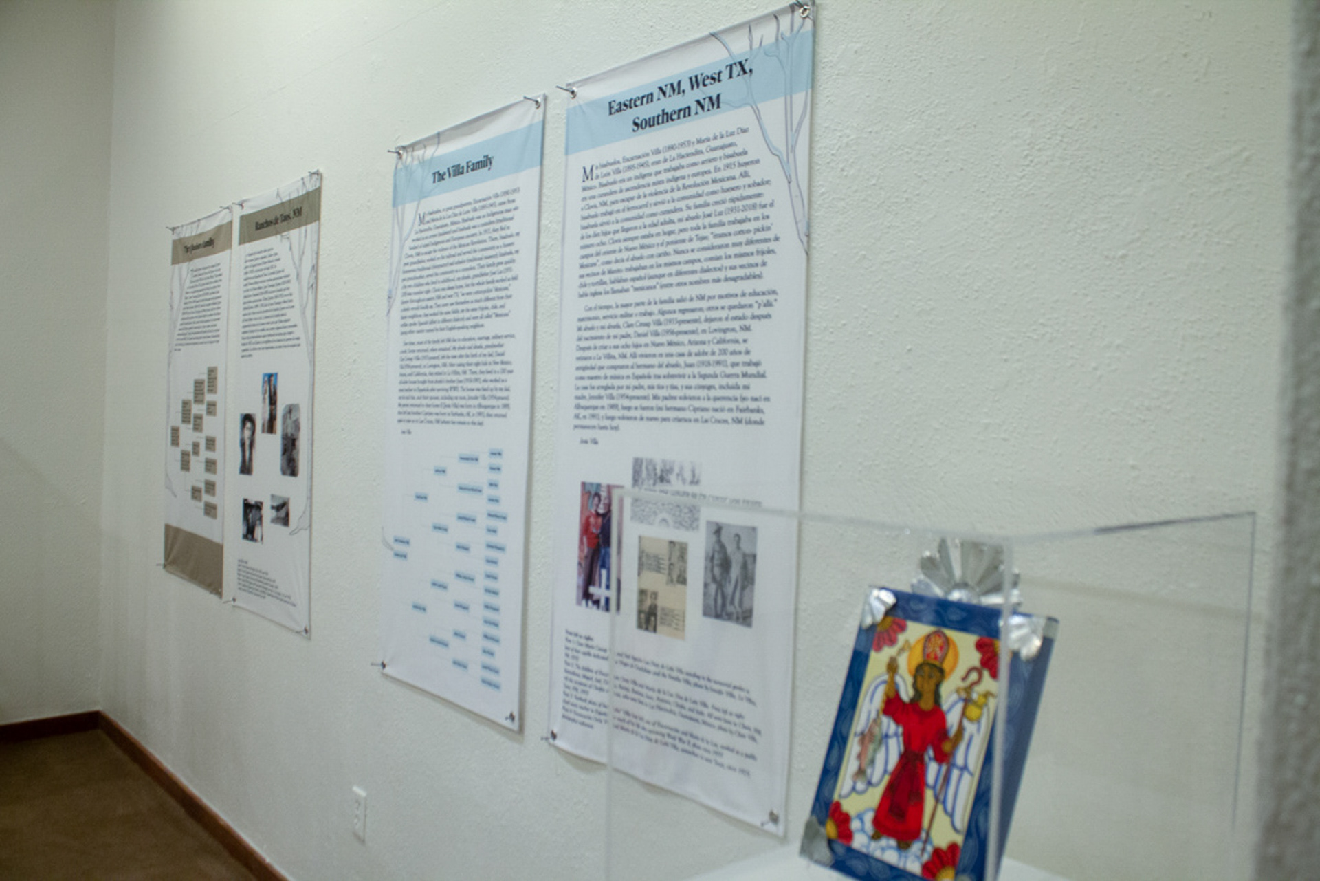 A row of panels of two different families and their backgrounds.