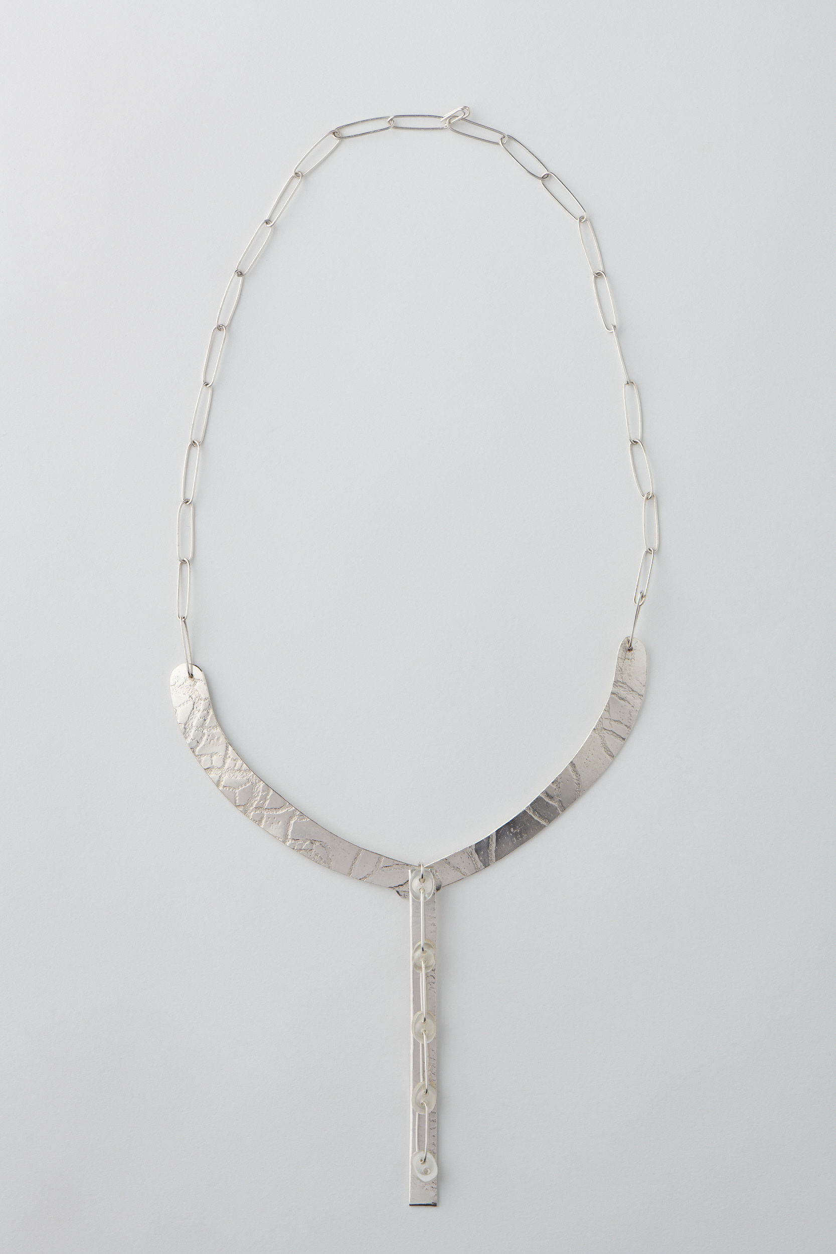 Preservation 3. Silver with plastic buttons. Photo by Fred Kroh, August 2021.