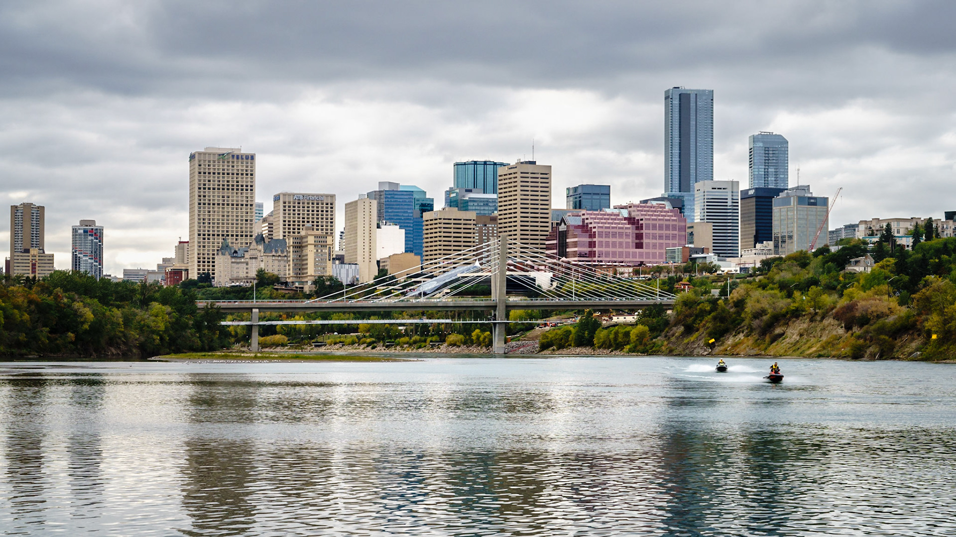North Saskatchewan River, the new LRT bridge under construction and the downtown core.