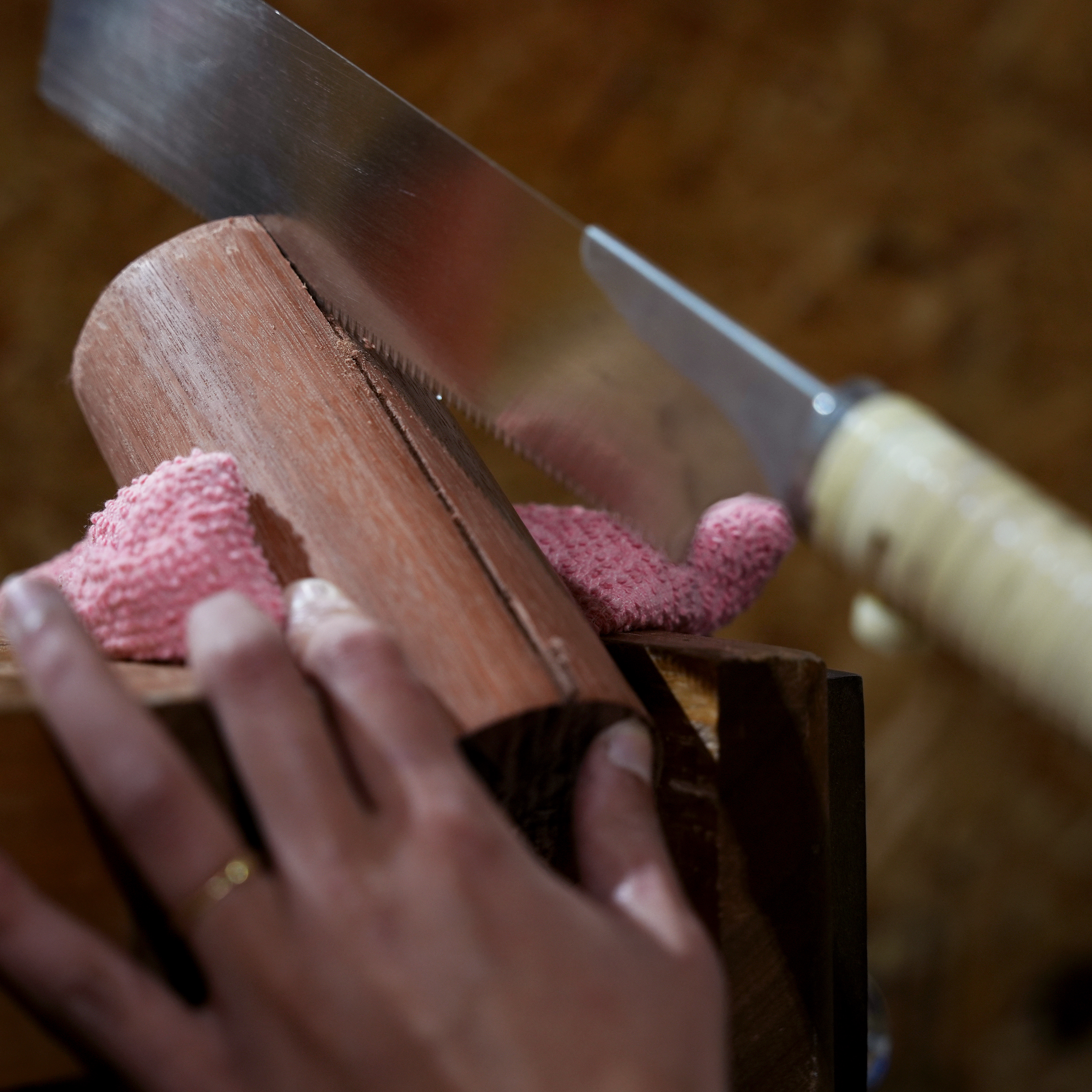 Hand sawing armrests.