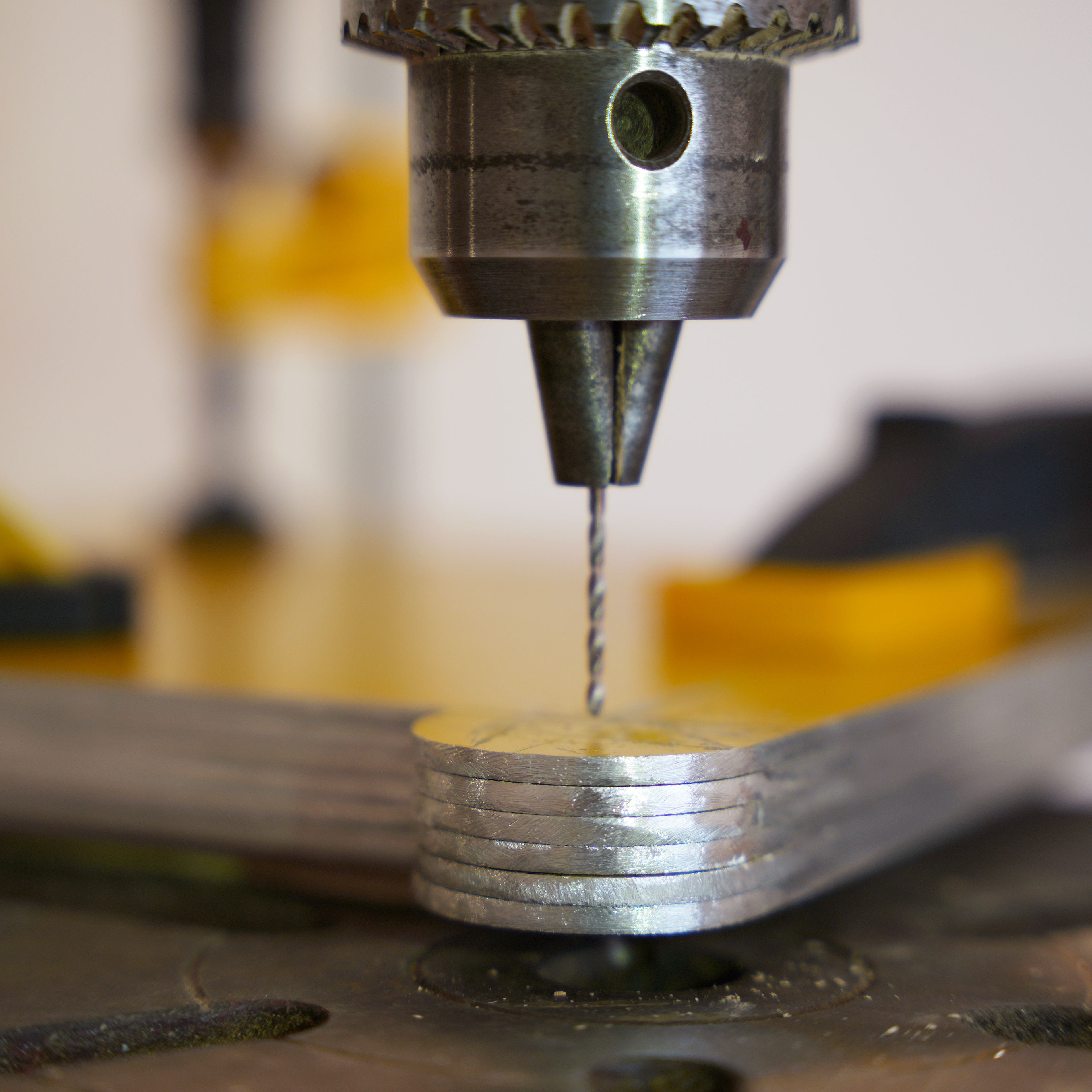 Drilling centre holes on aluminium ends.