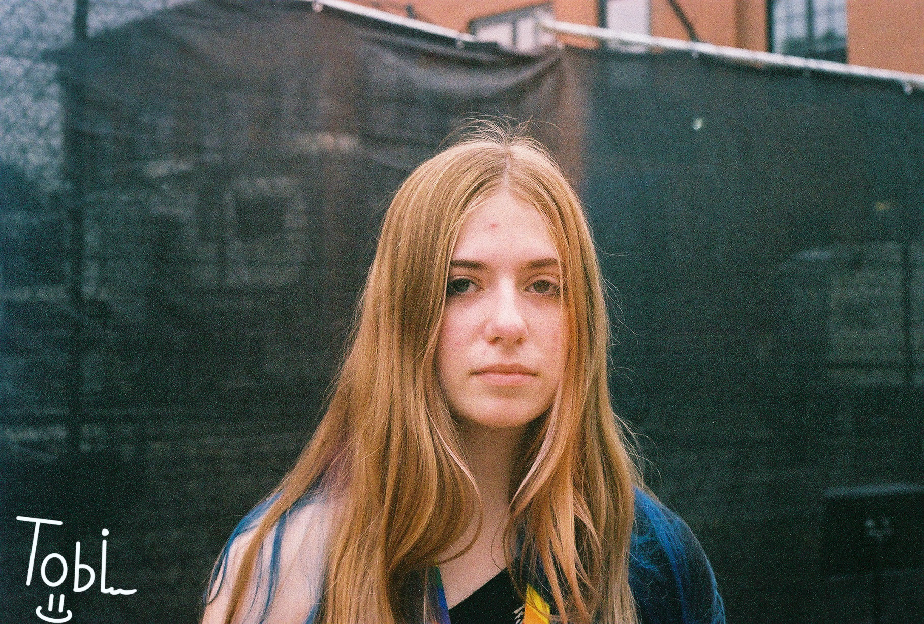 I took this photo on some expired color film of one of my best friends Lotus and I think her face card was lethal here. 