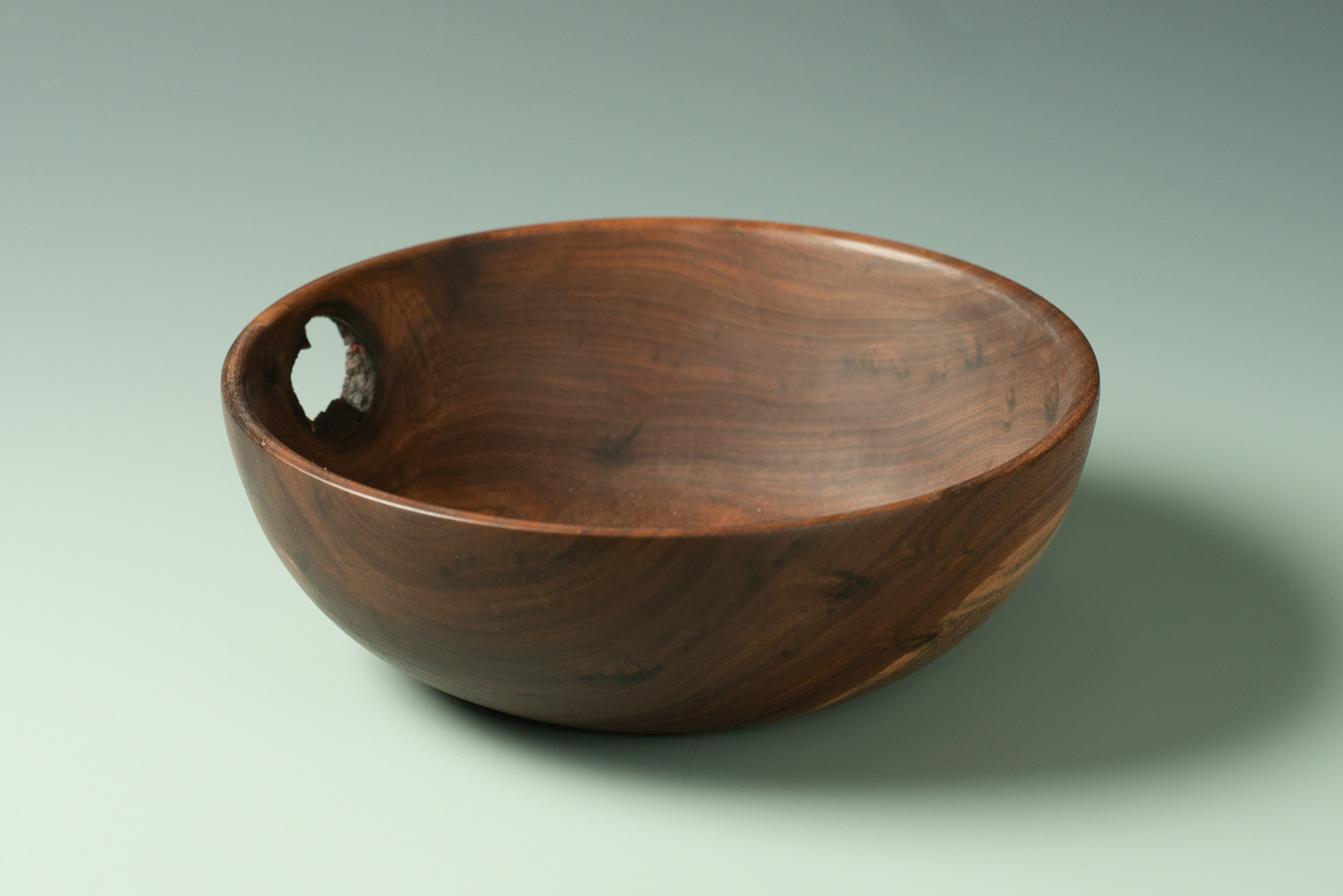 Walnut bowl with open knothole - 8" x 3" $75