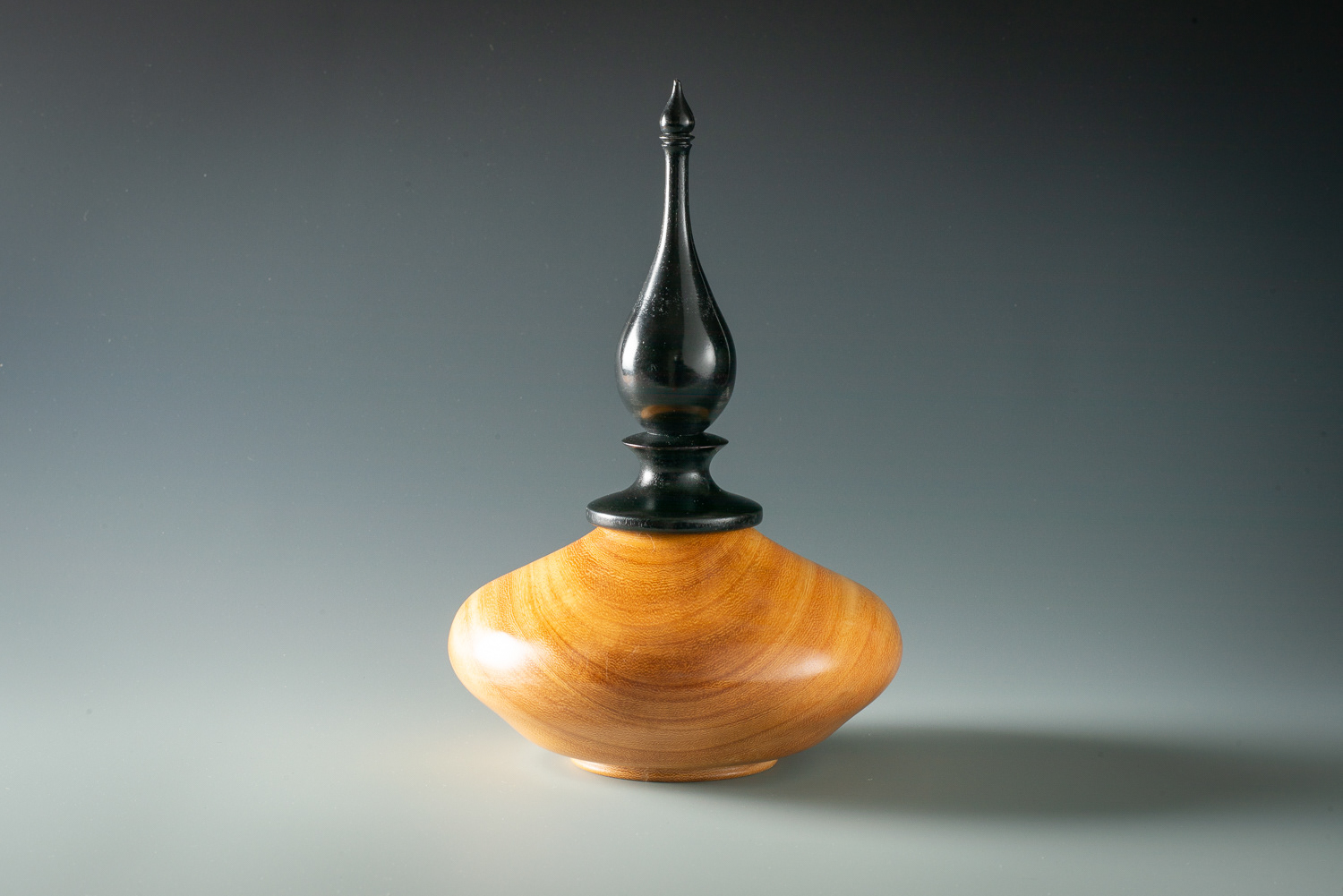 Osage Orange hollow form with ebonized maple finial. 6" X 9" - $125