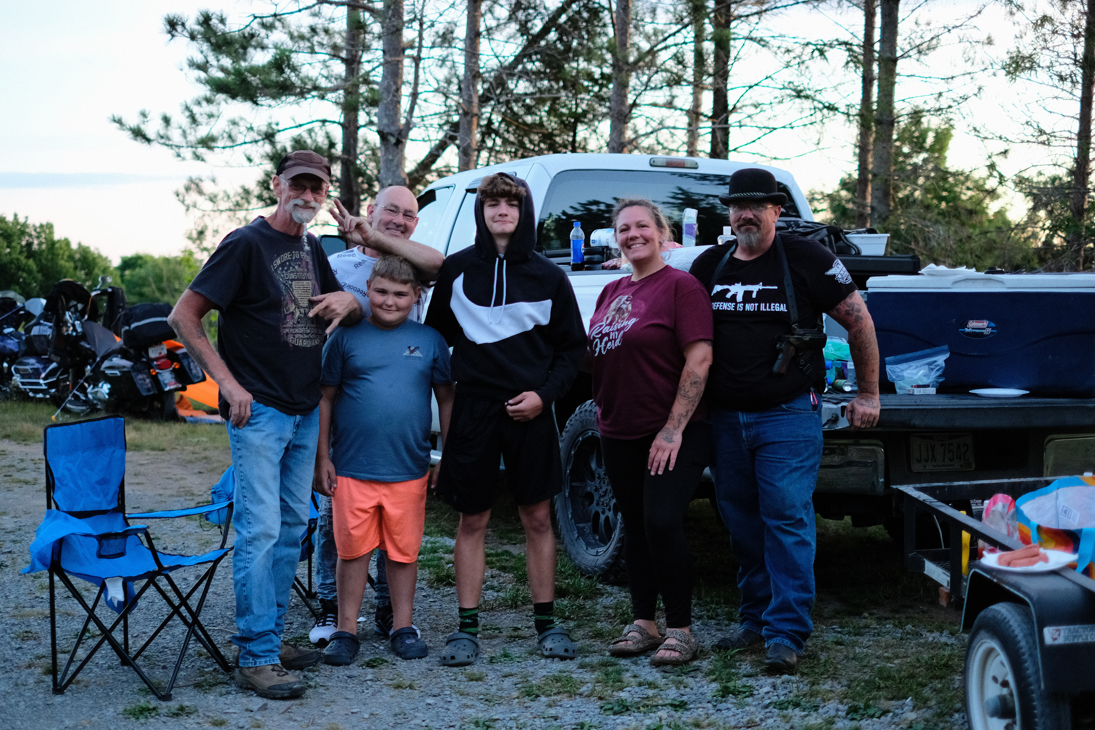 The Ohioans posing behind Nicole's truck