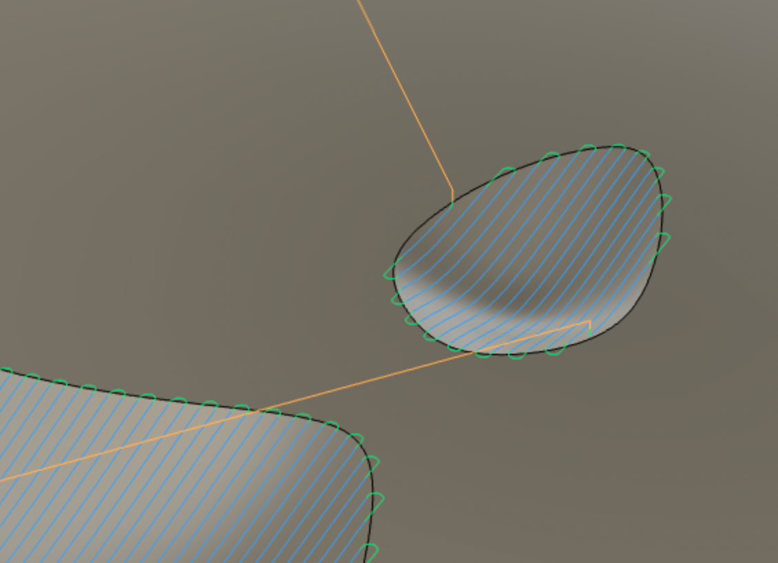 Detail showing a small undulation in the panel surface being carved used the parallel tool path