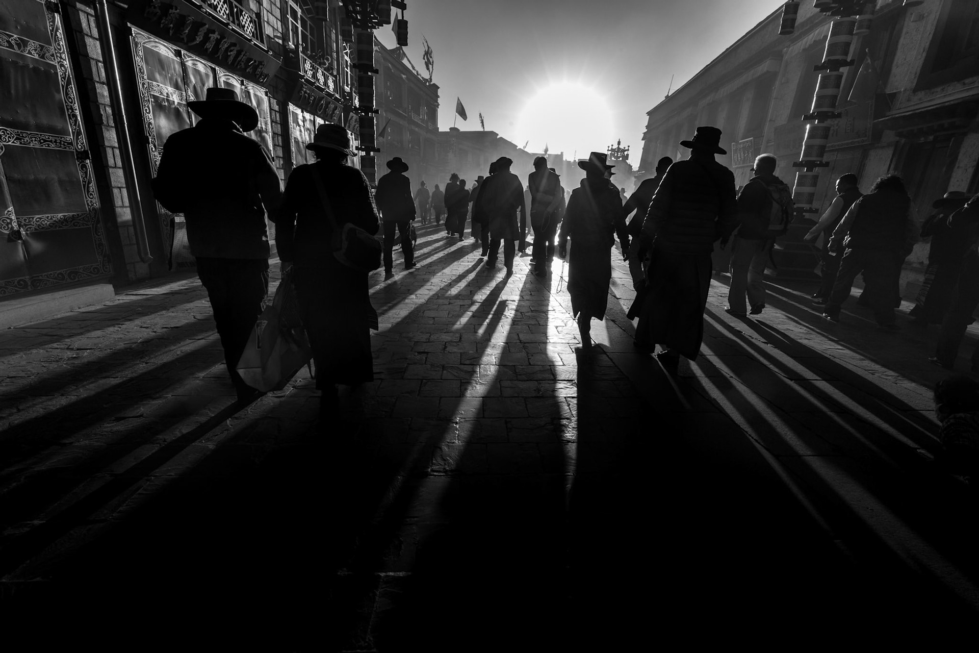 Shadows of Kora #3 Lhasa, Tibet. Sunrise , Kora time around Jokhang temple.