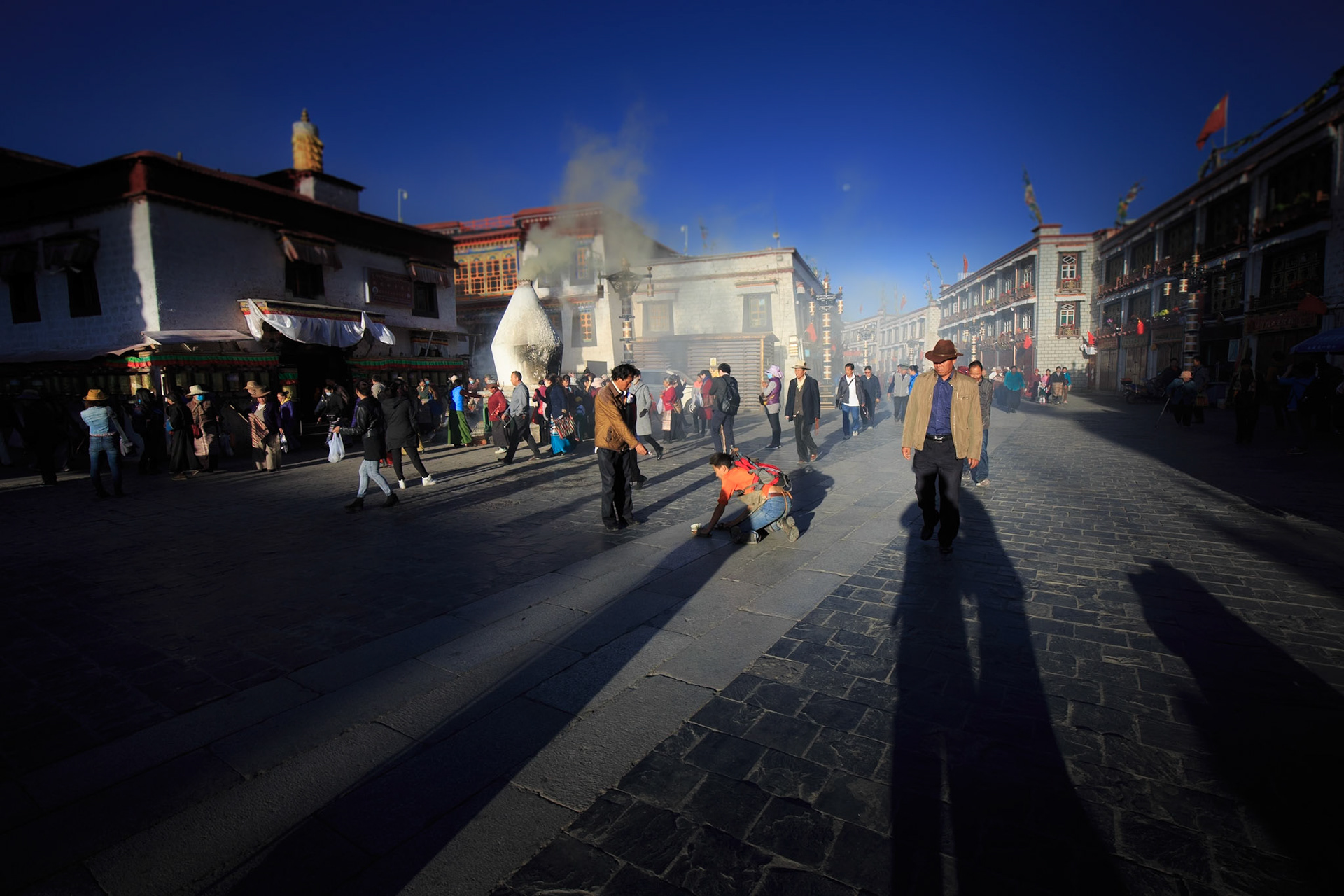 Shadows of Kora #2   Lhasa, Tibet. Sunrise , Kora time around Jokhang temple.