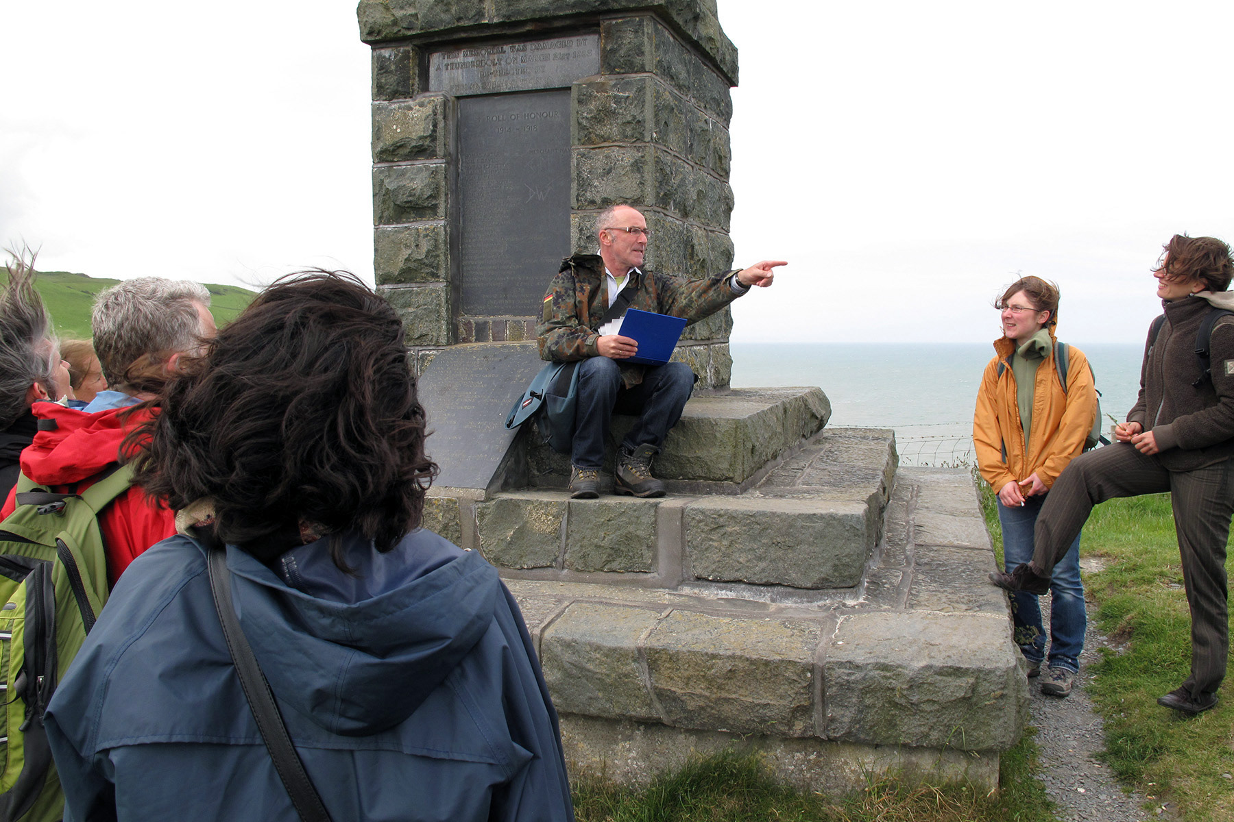 Pausing at the memorial on Borth cliffs