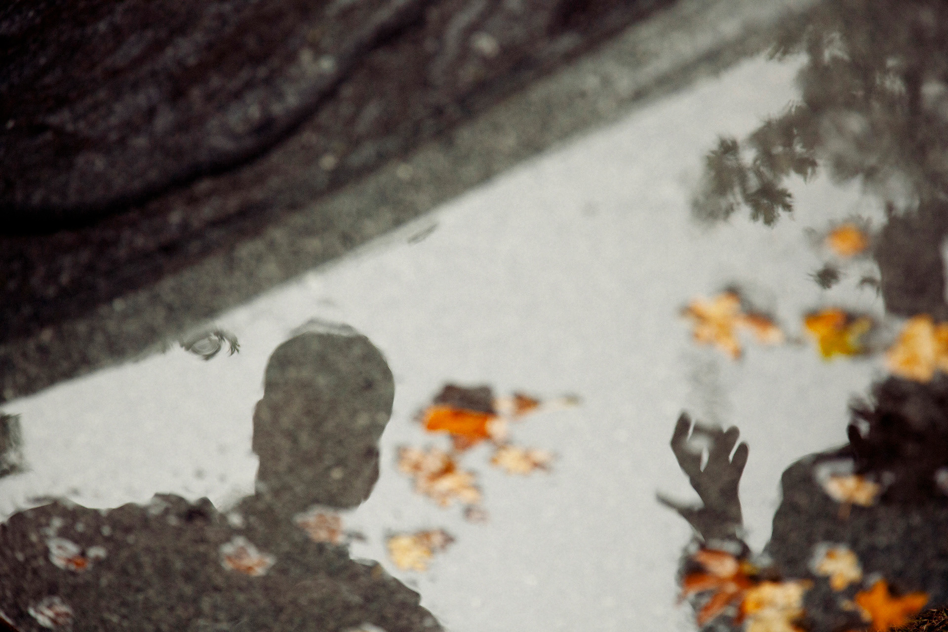 Reconnaissance Excursion #1: Professor Tim Lenton reflected in a storm puddle