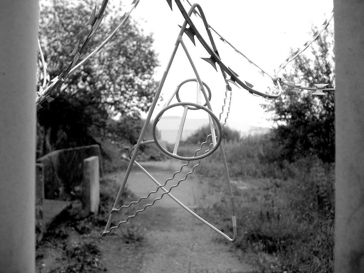 A beacon and razor wire
