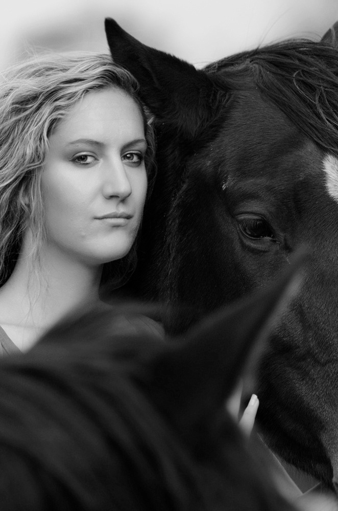 A girl amongst horses