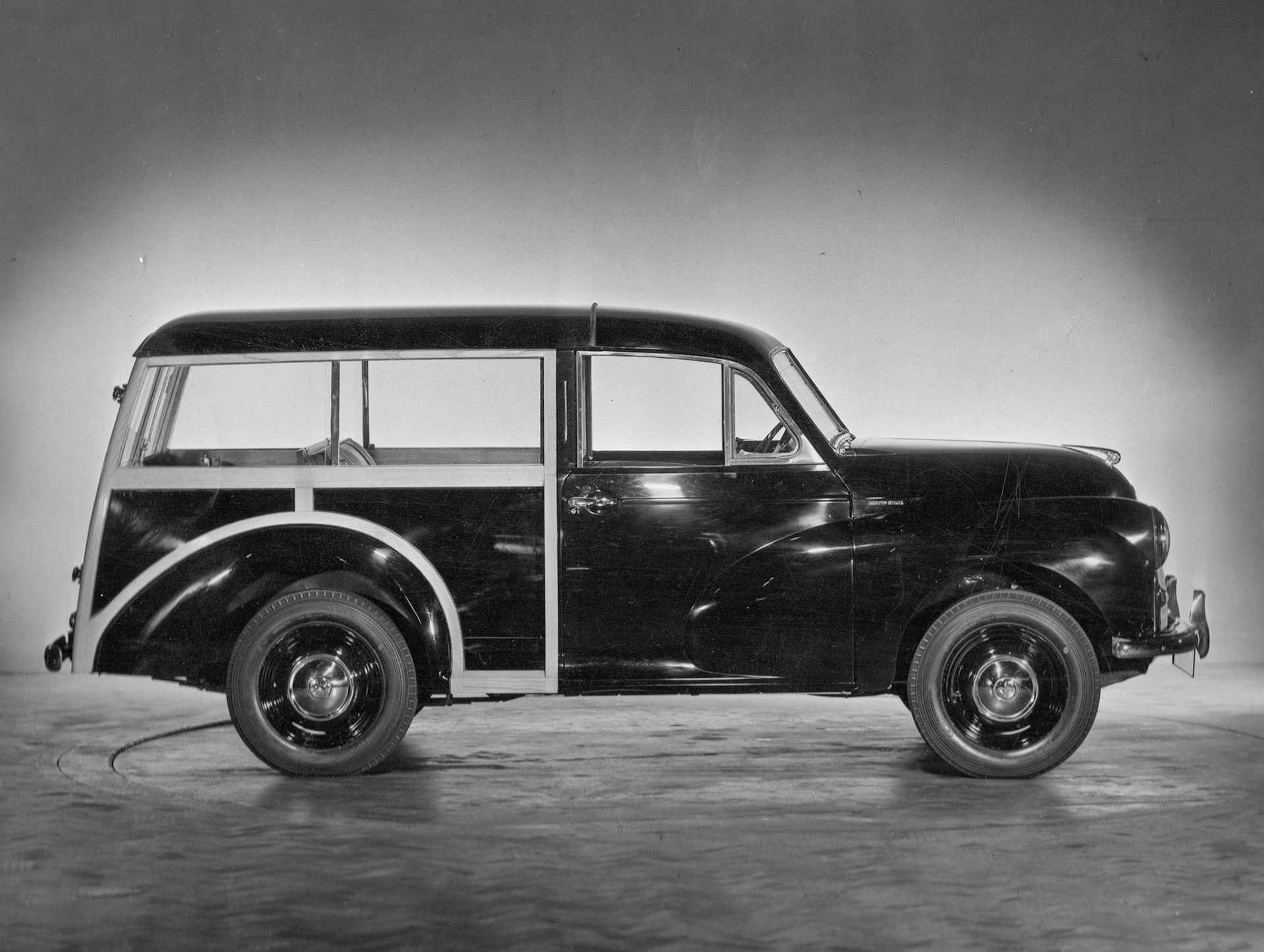 Morris Minor Travellers car: was announced in October 1953 with following comment: reasonable initial cost and roominess, combined with the Morris Minor's well known attributes of economy, performance and roadholding, make this new station wagon an attractive proposition for the family man, tourist or business man.