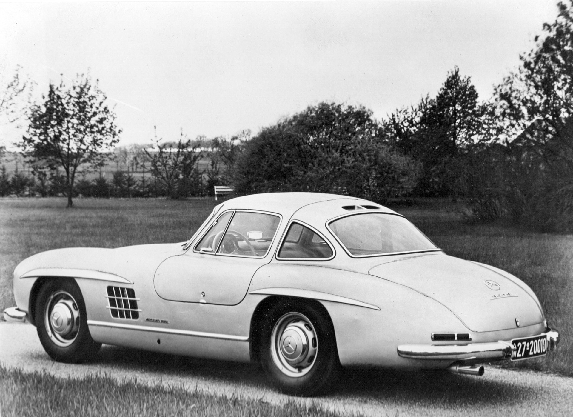 The Mercedes-Benz 300 SL sports coupé was the first car to be offered to the public with petrol injection in place of carburettrors. The 6 cylinder 3 liter engine developed 240 BHP on normal 80 octane petrol. A novel feature about the car is that the doors are hinged on the roof and open upward as on the 1952 Le Mans winning Mercedes. More information on this superb car on a.o. https://emercedesbenz.com/autos/mercedes-benz/sl-class/mercedes-benz-history-the-mercedes-benz-300-sl/.