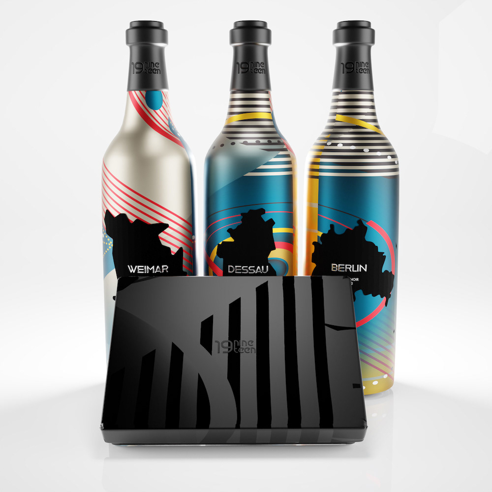 Wine and chocolate set with lid on. The materials are meant to emulate a soft touch texture with raised, spot-gloss accents