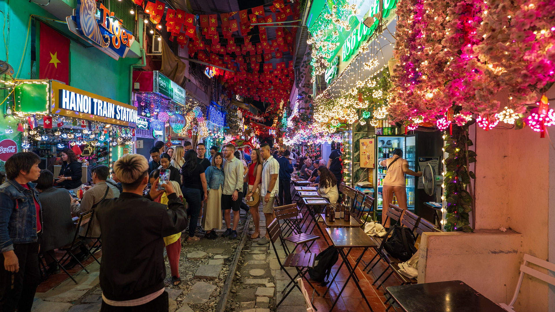 the senses are bombarded with the sights, sounds, and smells of Train Street