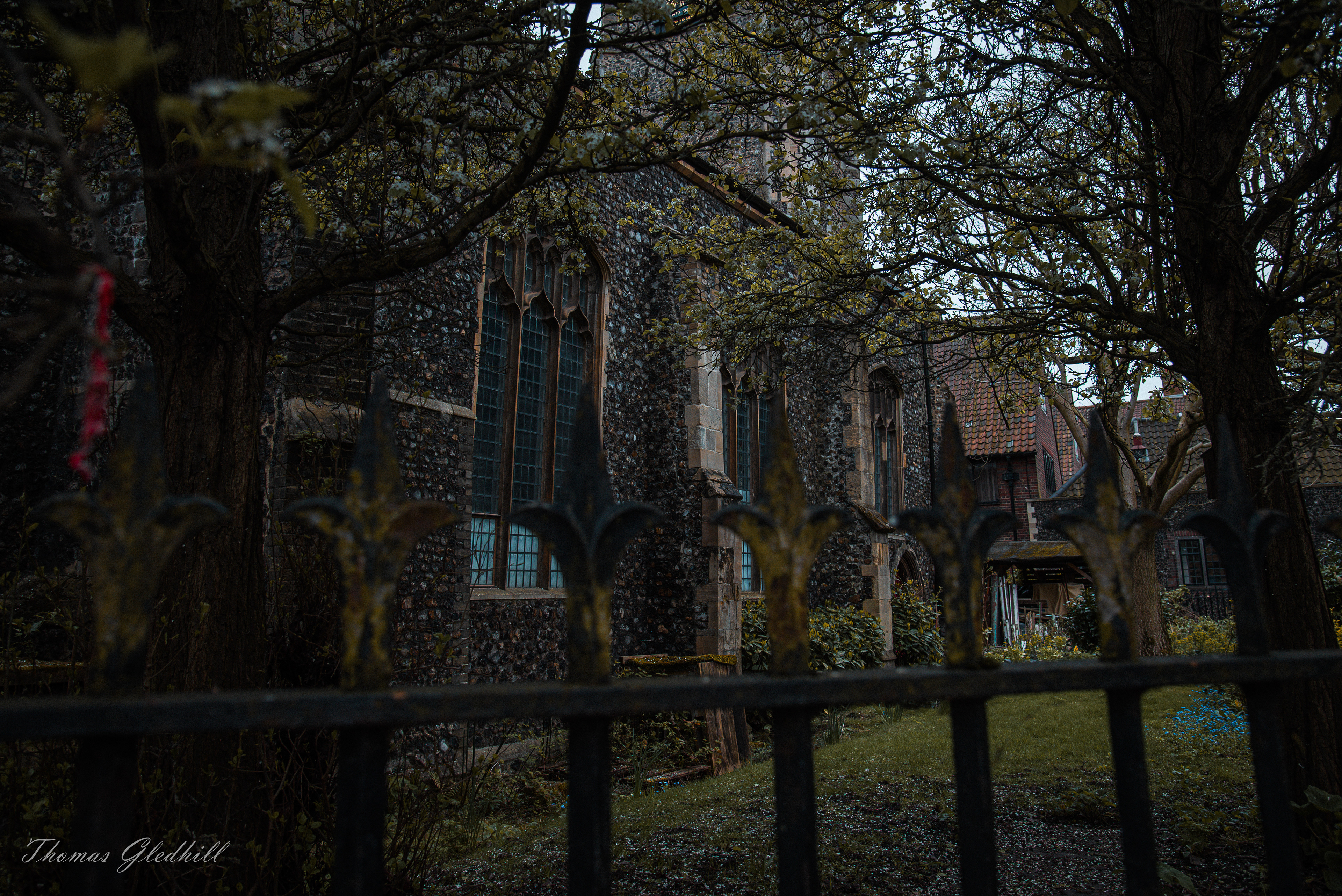 By the side of the Church