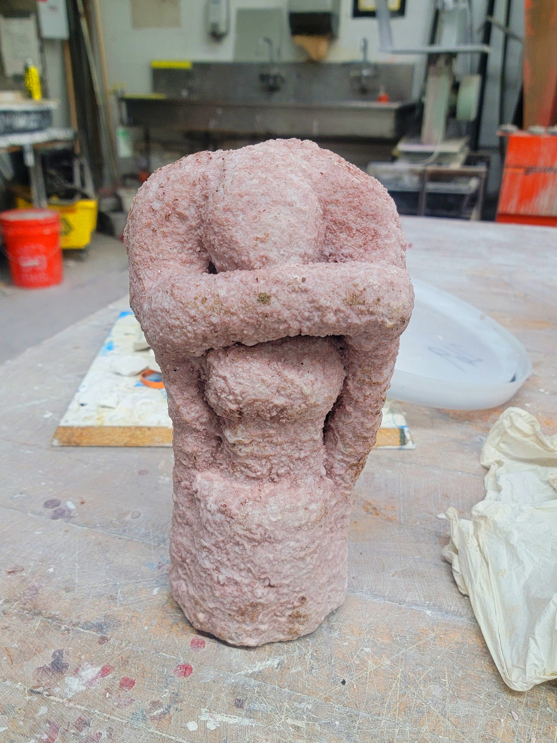 The wax assembly was dipped in slurry and ceramic in layers until a thick shell was made. The wax was then boiled out until the shell was empty.