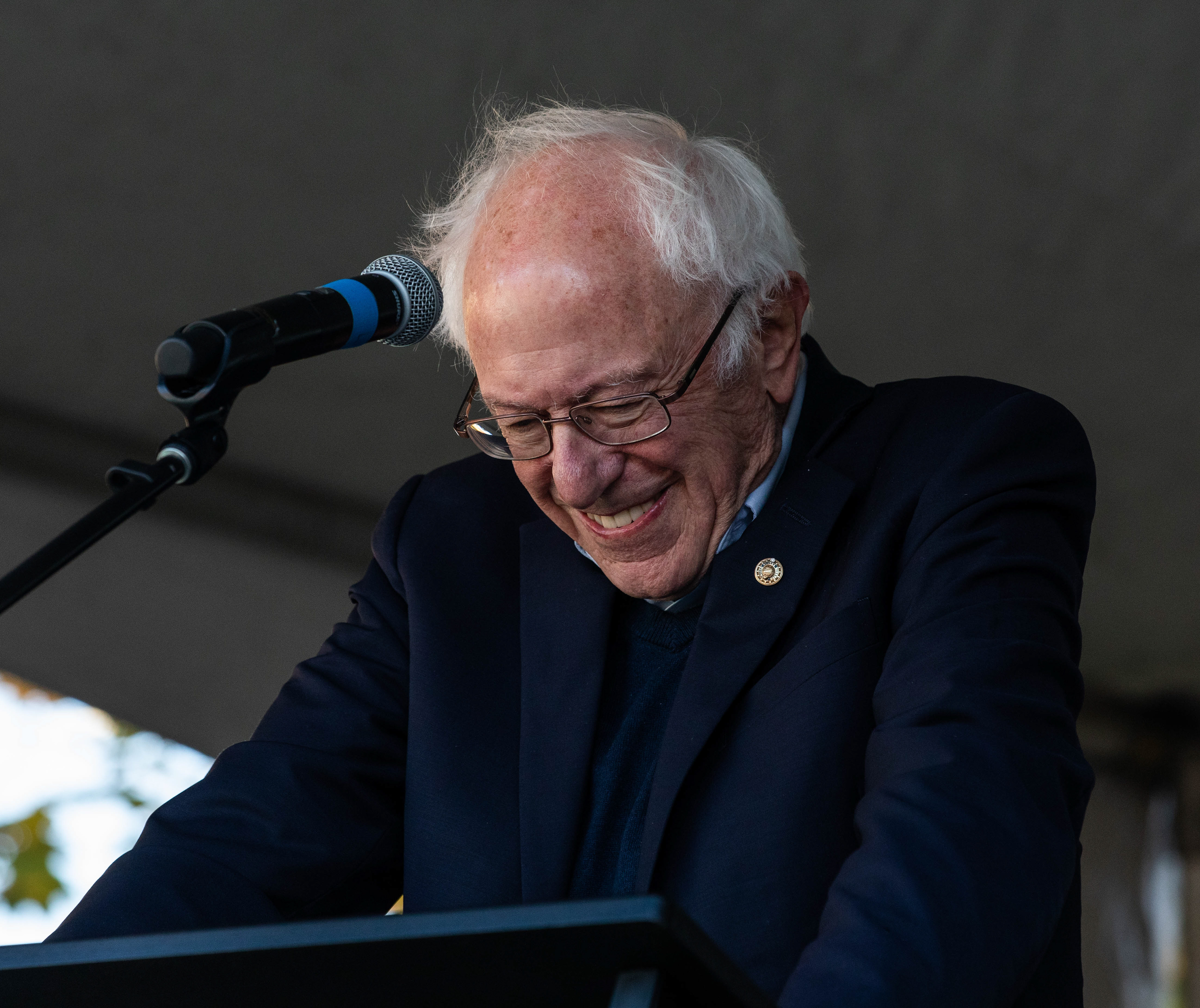 Vermont senator, Bernie Sanders, smiles to himself before beginning his speech at the democratic rally hosted in the EMU amphitheater. Vermont Senator Bernie Sanders joined Oregon’s Democratic party leaders at the University of Oregon’s Erb Memorial Union for a rally in support of Oregon Democrat Gubernatorial candidate Tina Kotek, on Thursday, Oct., 27th, 2022. (Maddie Stellingwerf/ Emerald)