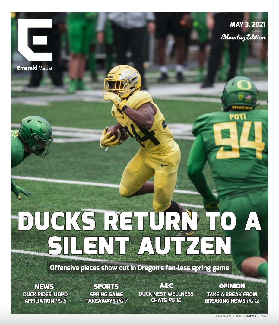 Ducks running back Aaron Smith (34) rushes through Green teams defense towards the goal line. Oregon Ducks Football host annual Spring game at Autzen Stadium in Eugene, Ore., on May 1, 2021. (Maddie Stellingwerf)
