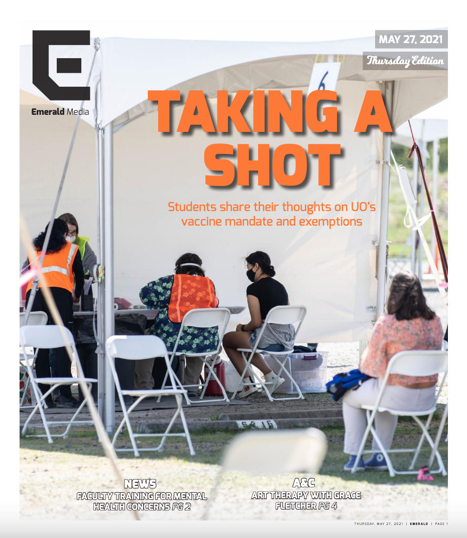A patient is being prepared to receive the vaccination inside one of the walk up tents. University of Oregon begins to distribute Vaccines to Students and Faculty on April 21, 2021. (Maddie Stellingwerf/Emerald)