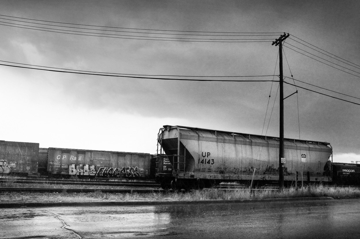 Lonely Car Under Power Lines