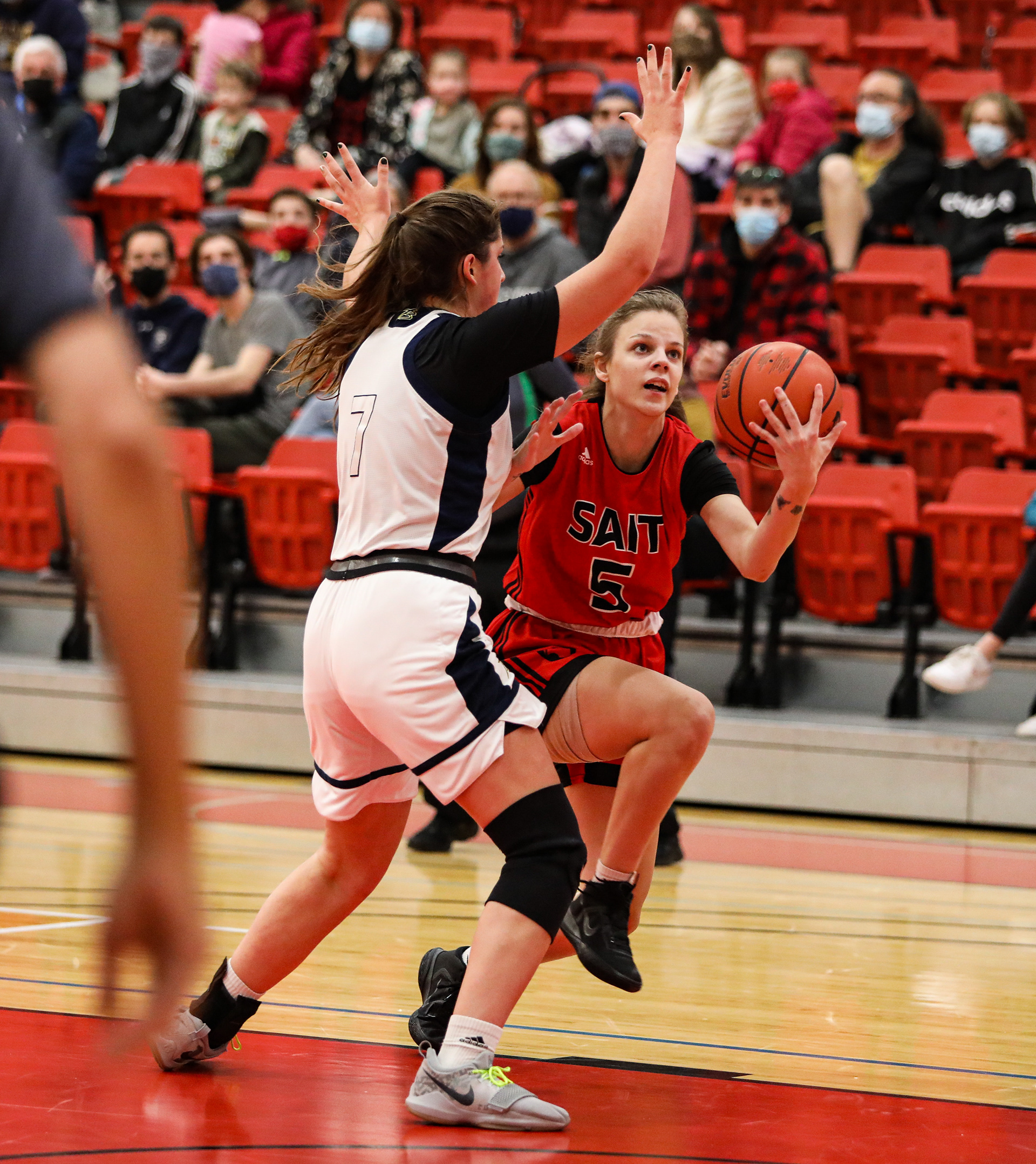 SAIT Trojans guard Kyler Varga shoots her team’s match against Briercrest college at the SAIT gymnasium.