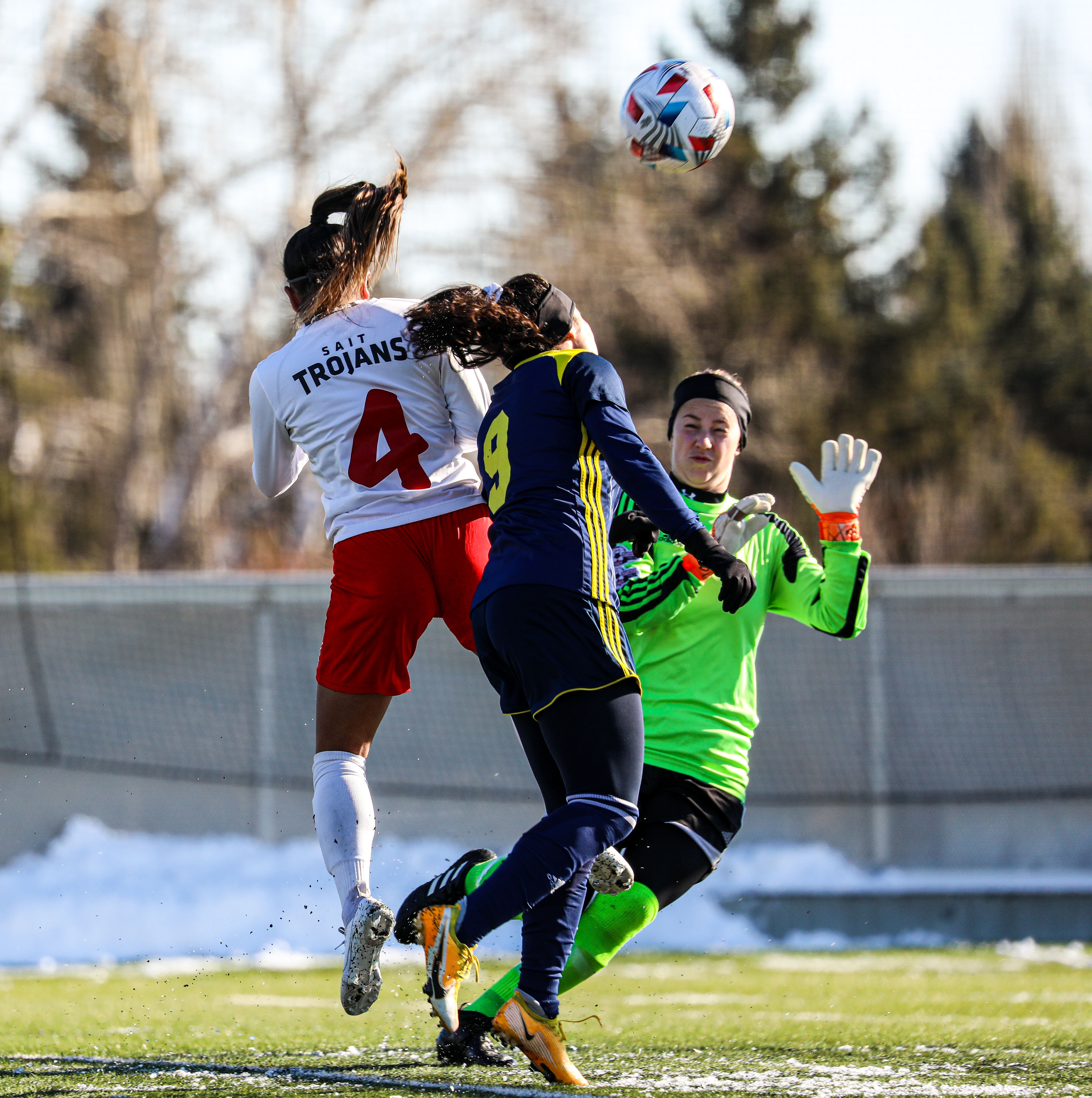 SAIT Trojans Forward Harleen Singh tries a header against NAIT Ook at SAIT’s Cohos Commons Field in Calgary on Saturday, Oct. 30,2021.