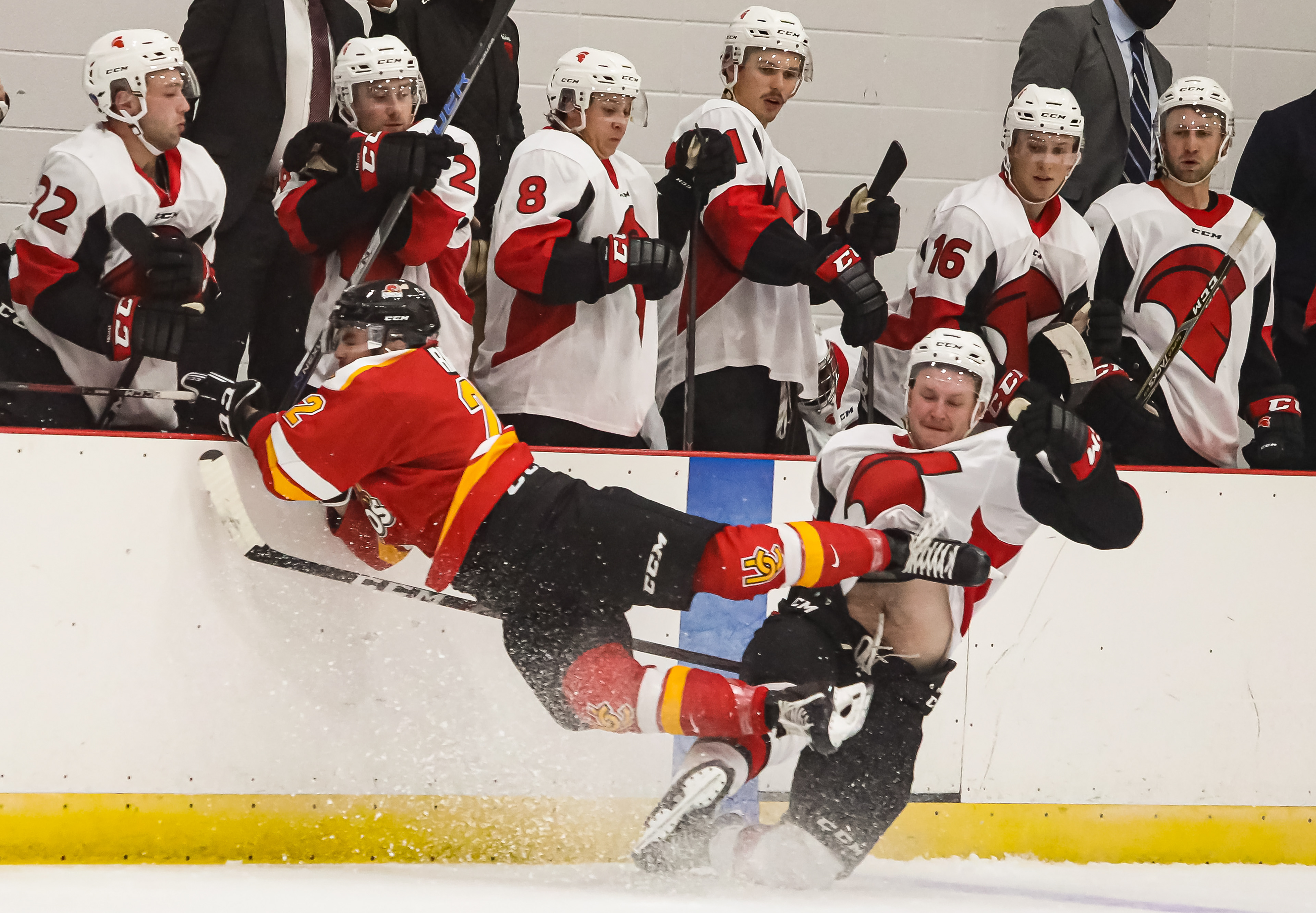 SAIT Trojans player collides during a game against the U of C Dinos at the SAIT arena in Calgary on Wednesday, Sept. 15, 2021. The U of C Dinos defeated the Trojans, 8-1.