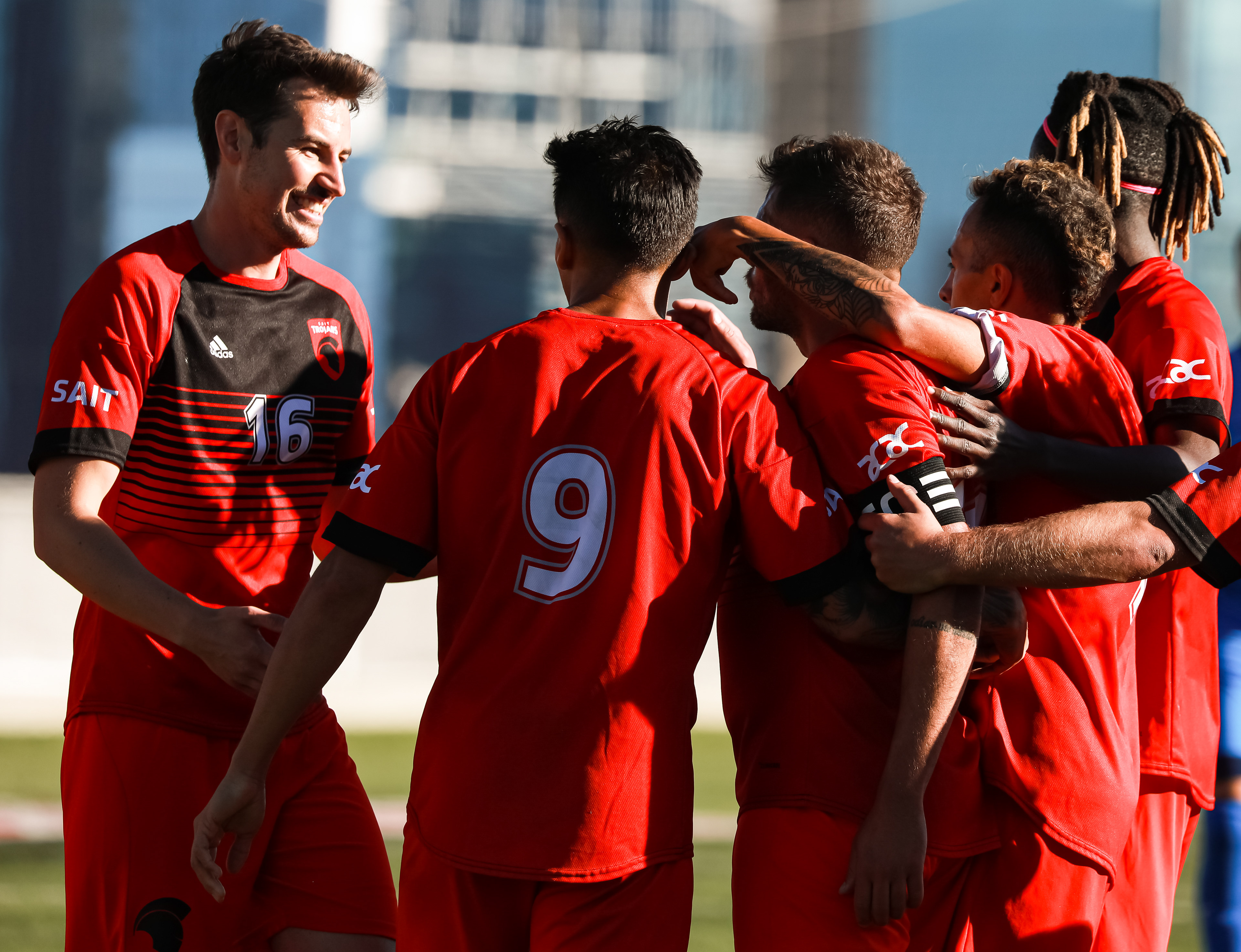 SAIT Trojans' players enjoy right after scoring the winning goal against the Medicine Hat College Rattlers at SAIT’s Cohos Commons Field in Calgary on Sunday, Oct. 3, 2021. The Trojans beat the Rattlers by a score of 2-0 in Alberta College Athletic Conference men’s soccer action.