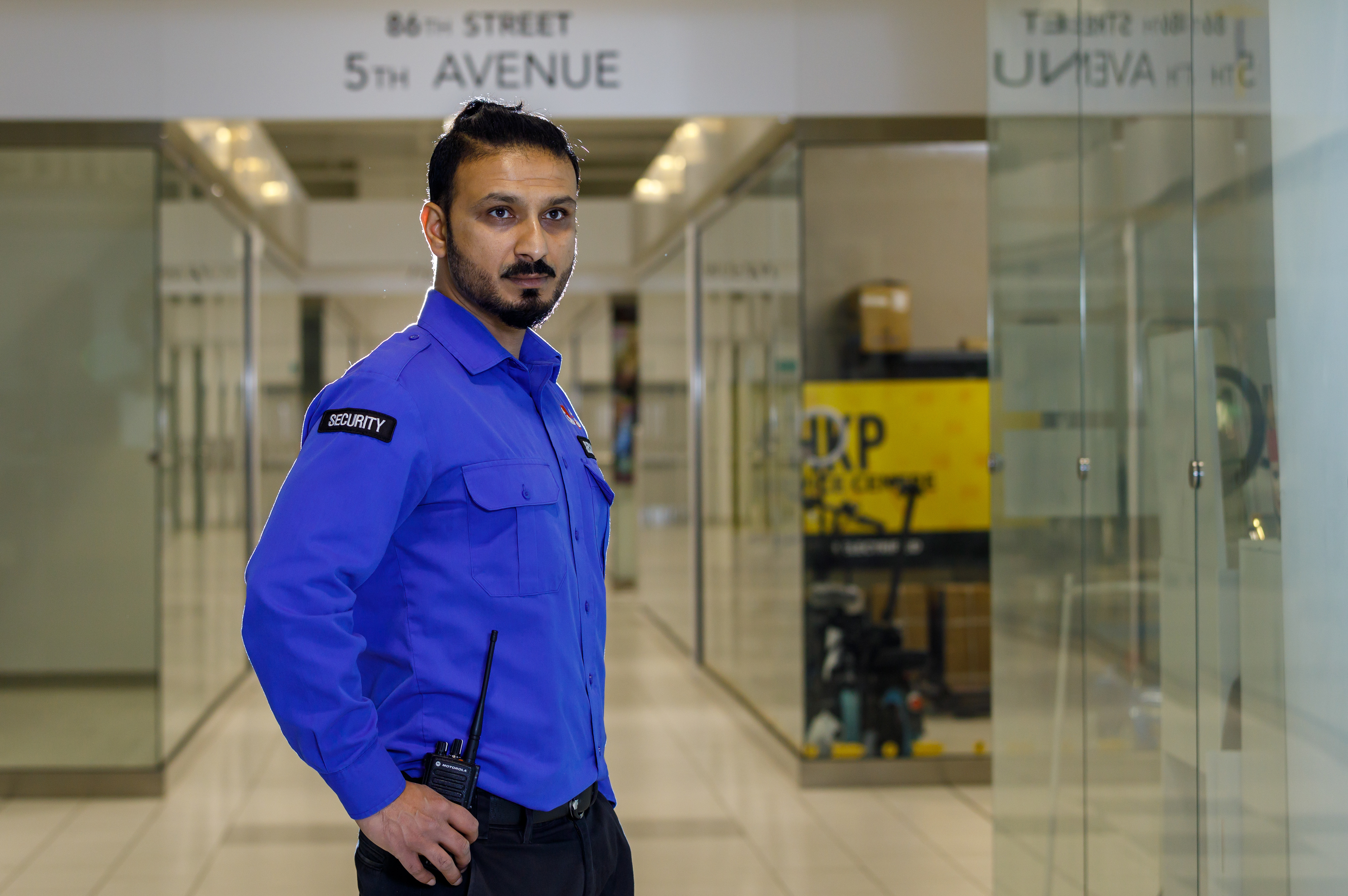 Tanka M. Gautam, a security guard, poses for a portrait at his workplace New Horizon Mall in Calgary on  Saturday, Nov. 6, 2021. 