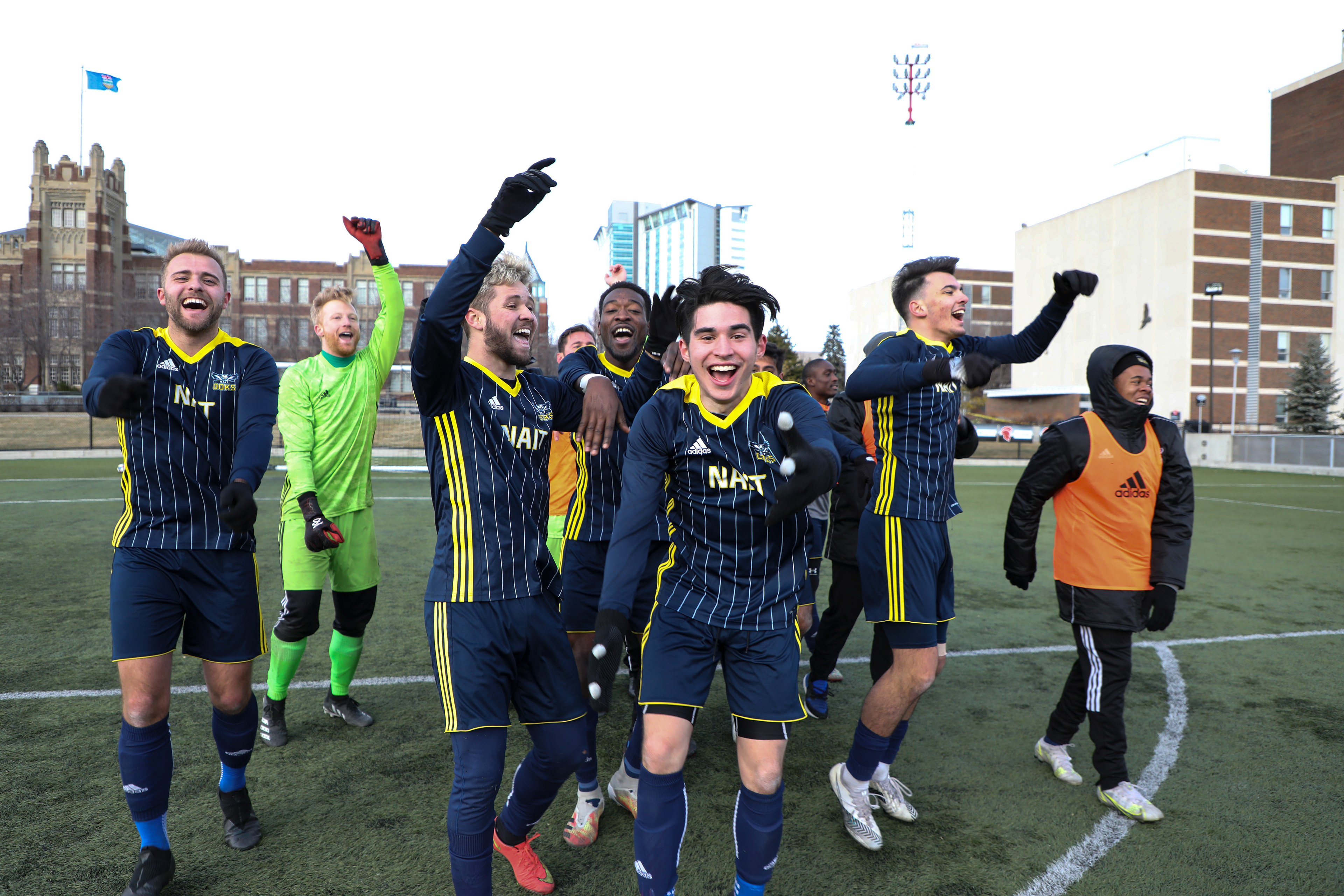 The NAIT Ooks plays cheer when the bronze medal is confirmed against the Montmorency College Nomades in men’s soccer action.