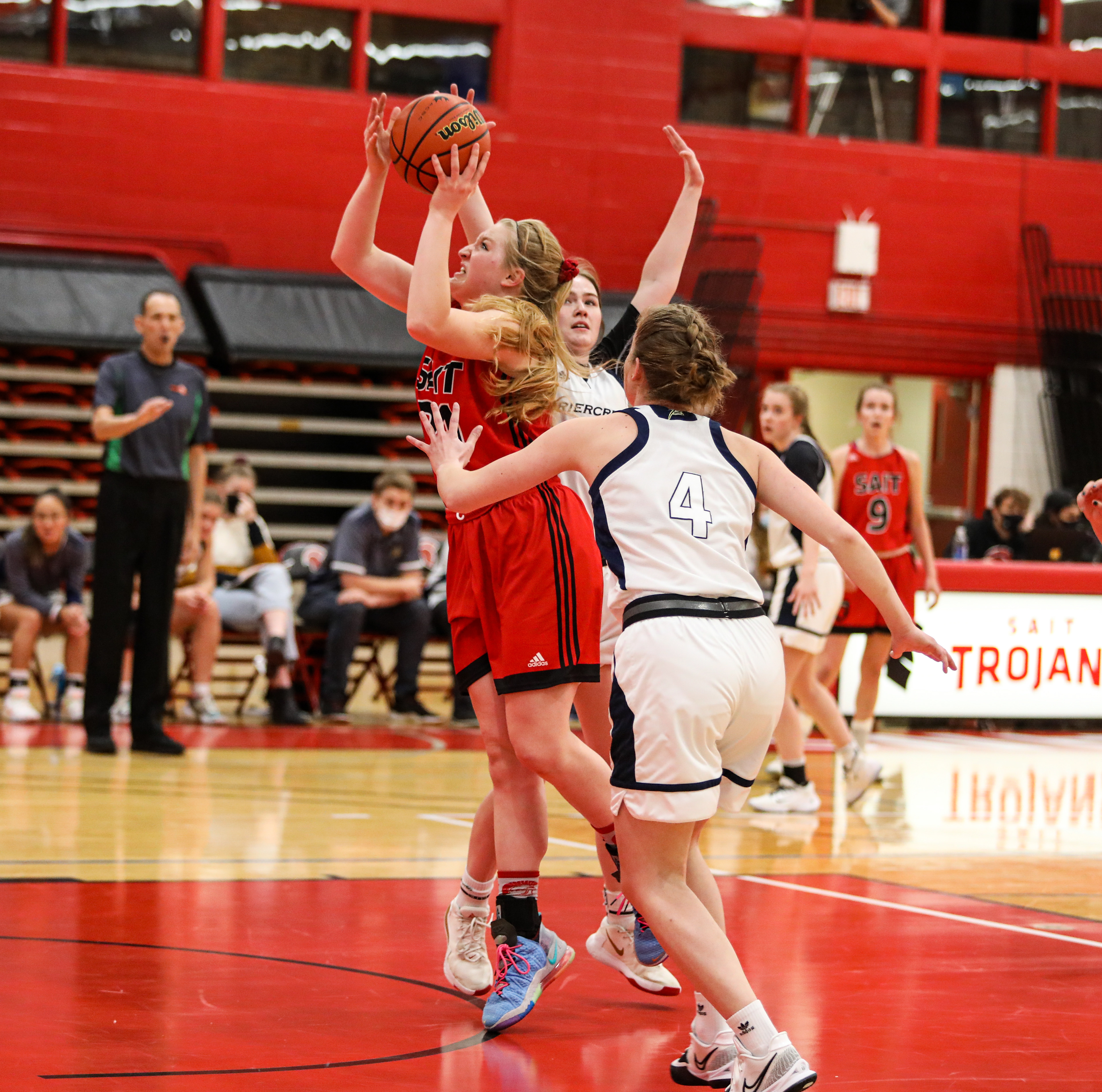 SAIT Trojans forward Sadie Kupery shoots her team’s match against Briercrest college at the SAIT gymnasium.