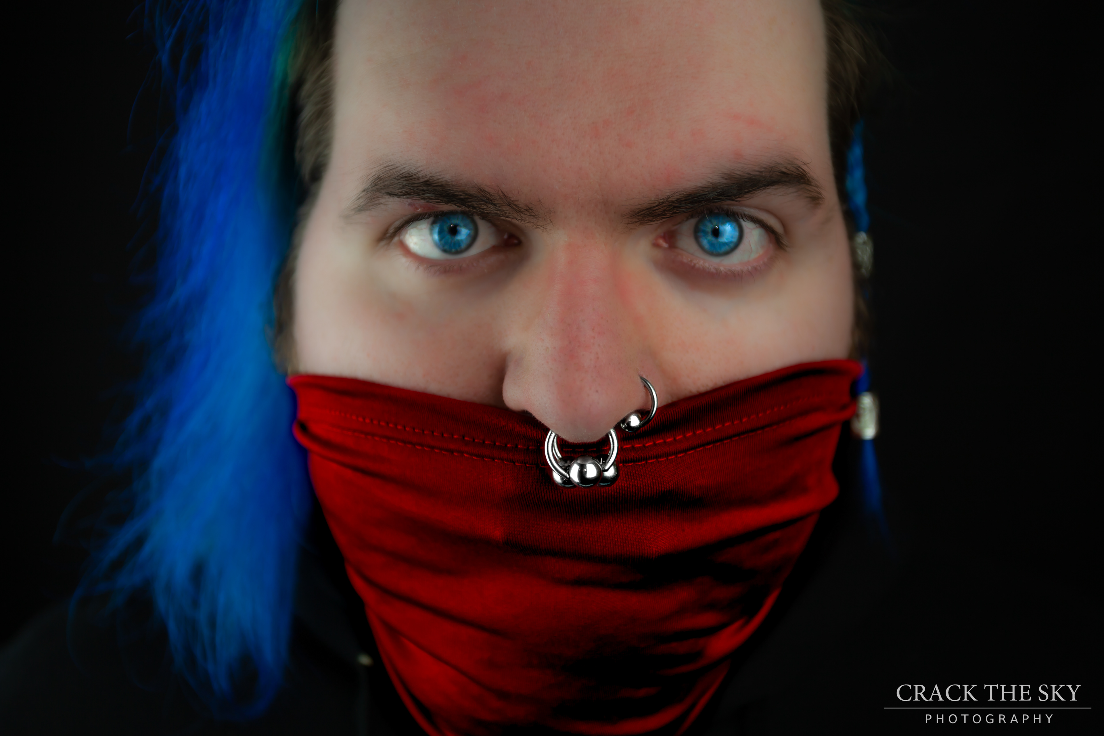 Facial piercings (Double septum, left nostril)