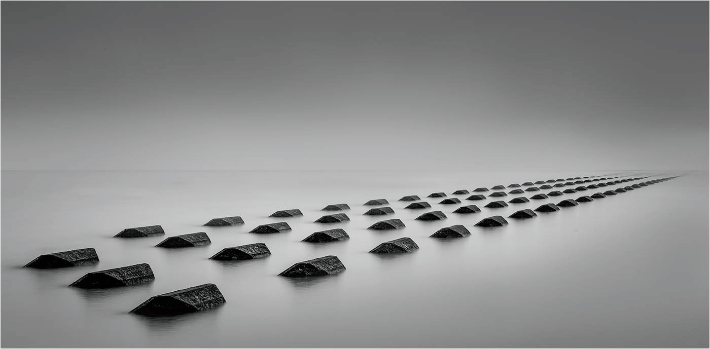 The groynes (sea defences) at New Brighton on Merseyside