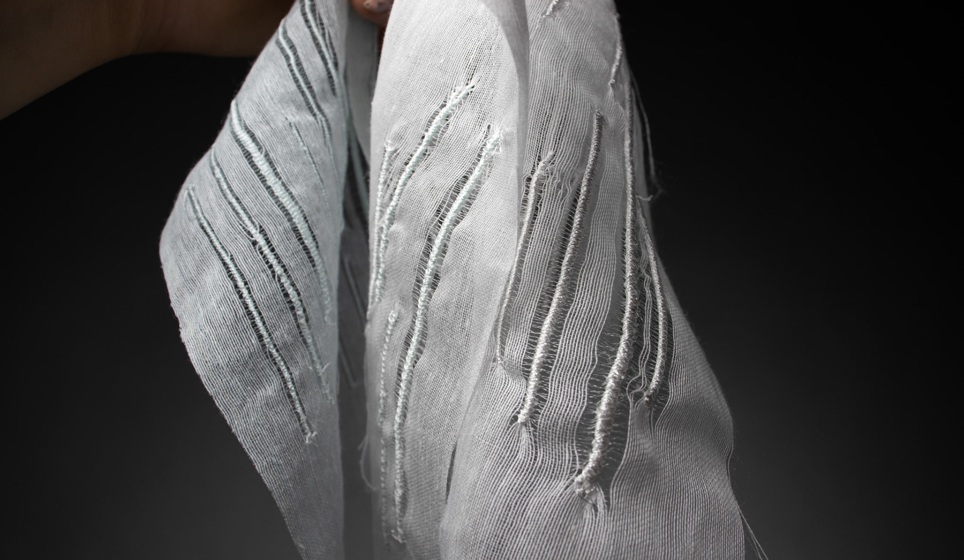 Wing needle sample on open weave silk for ROMO- Black edition.