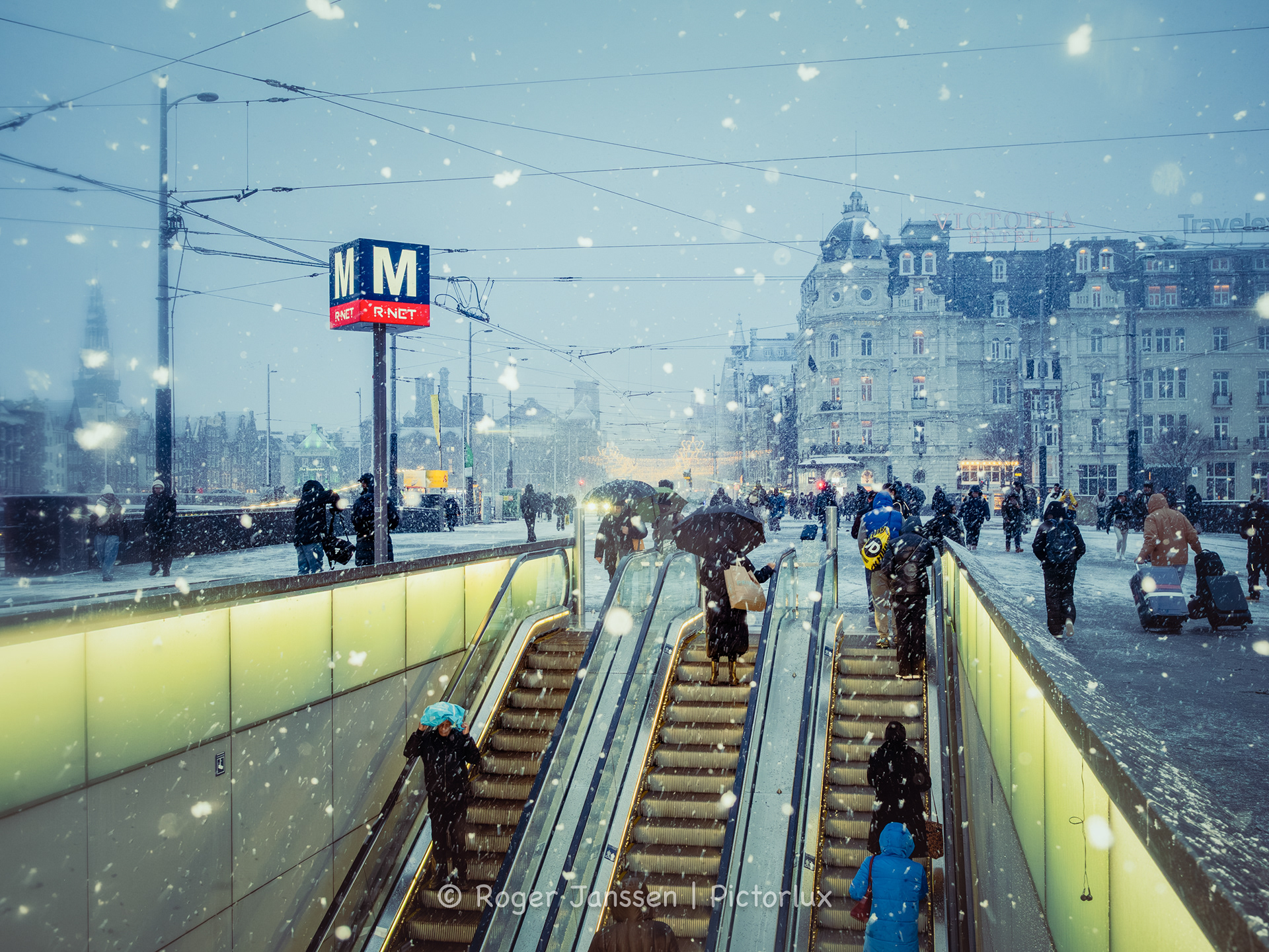 Central Station in Amsterdam during a snow blizzard.