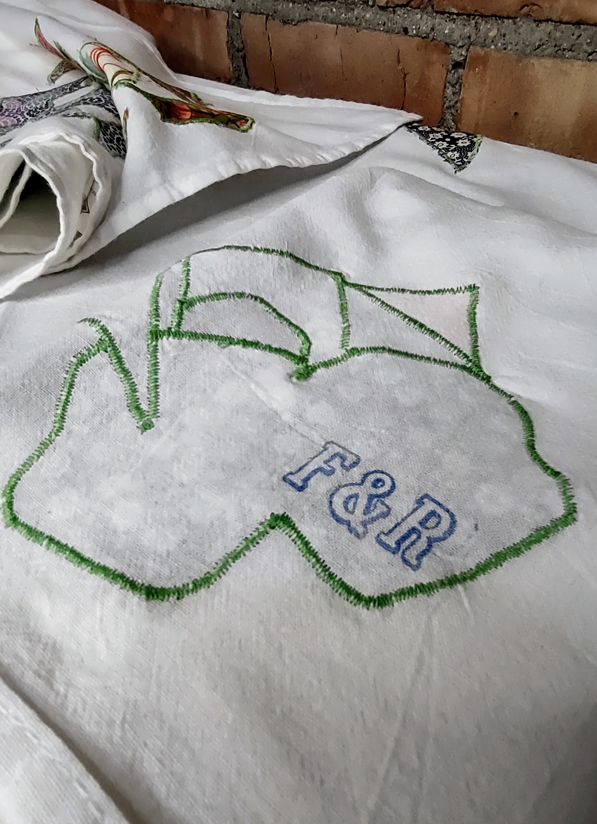 Detail on Large Cotton Tea Towel, stitching and F&R logo
