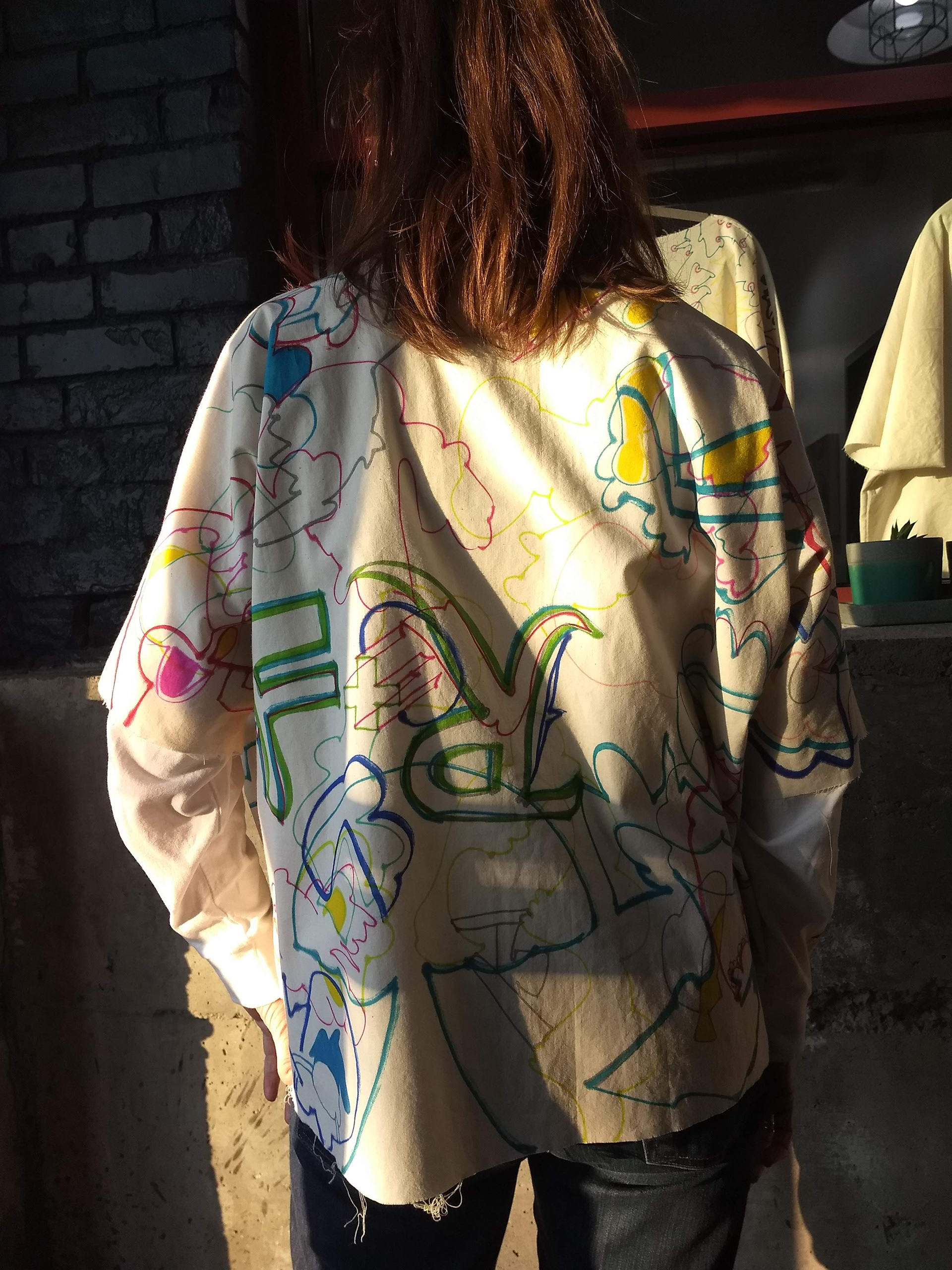 Lisa DeFrance wearing an original tunic