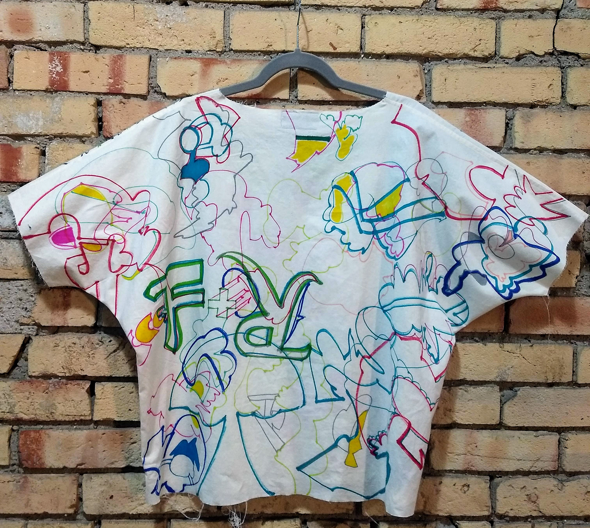 Back of tunic with original artwork