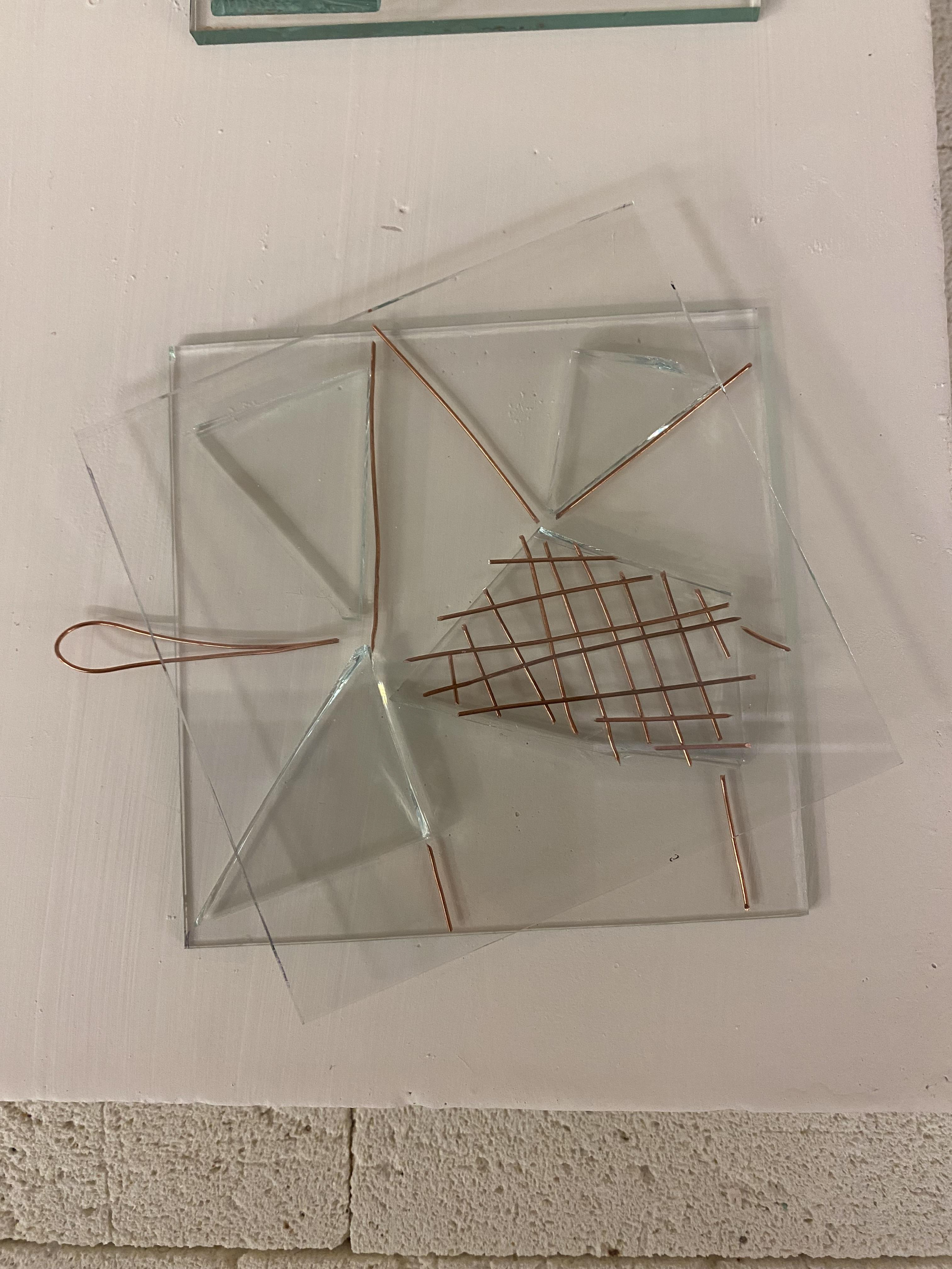 Sample piece using copper wire trapped in float glass