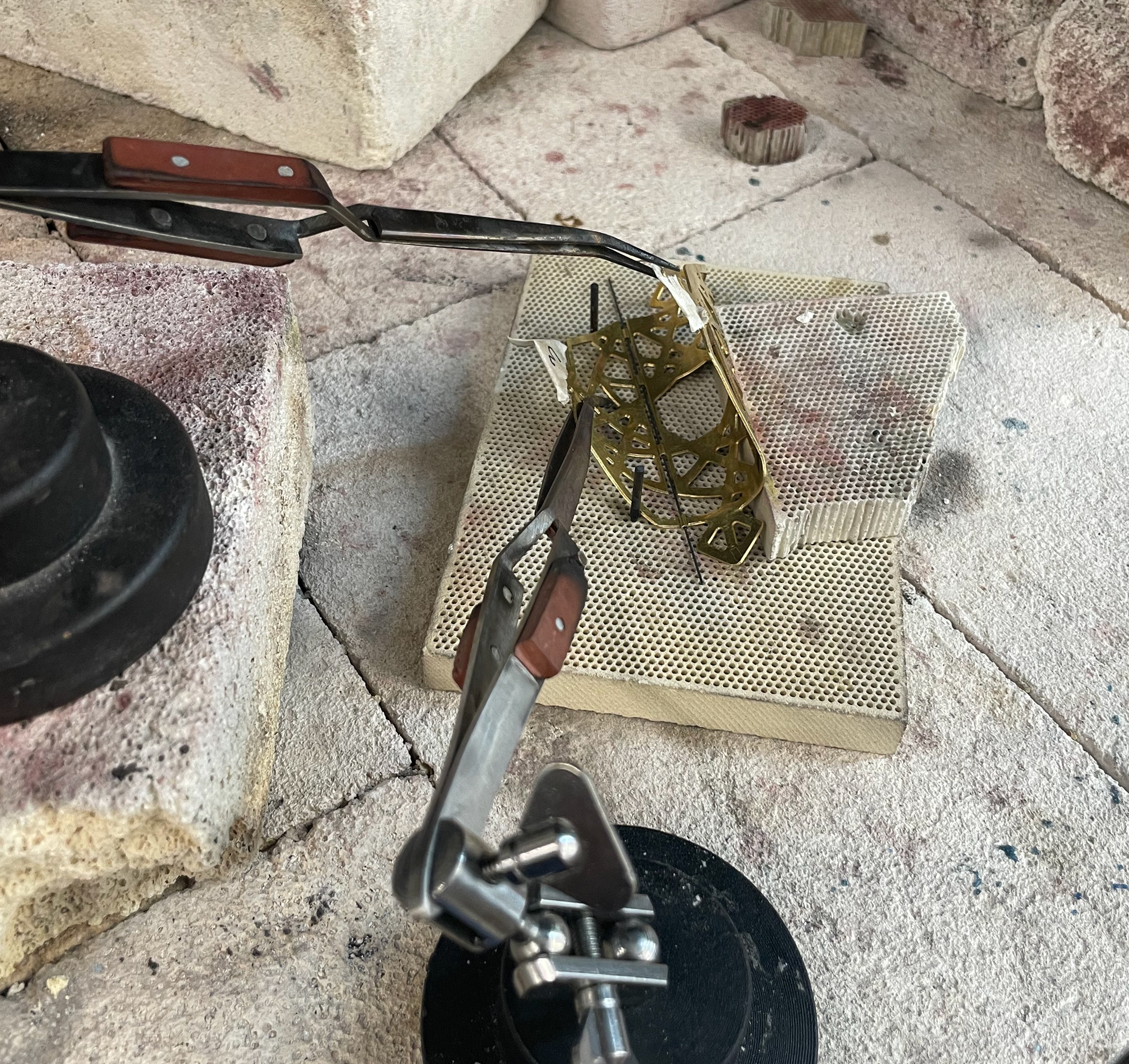 Using third hands to hold pieces in place